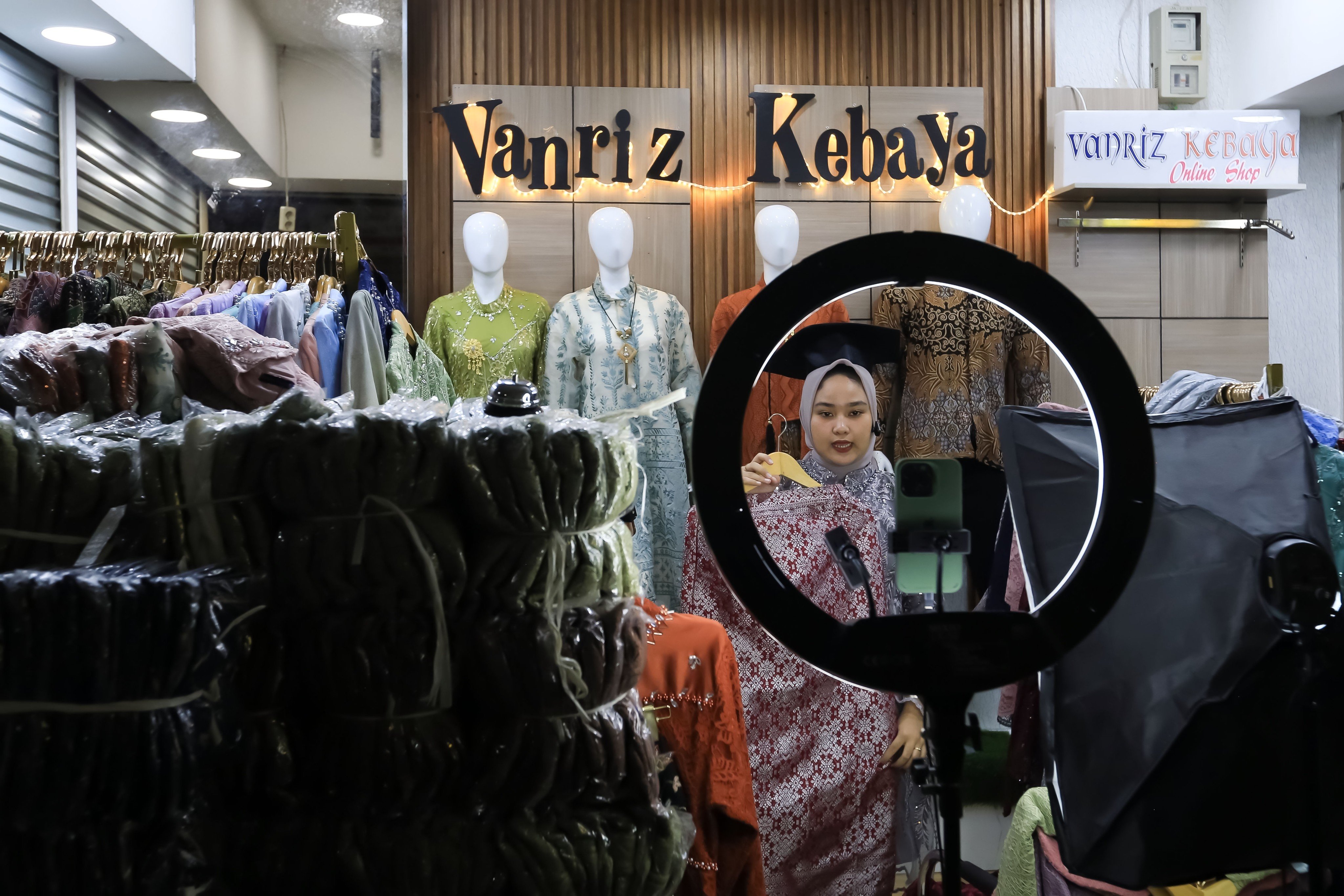A woman in Jakarta livestreams a sale on TikTok. Photo: Shutterstock 