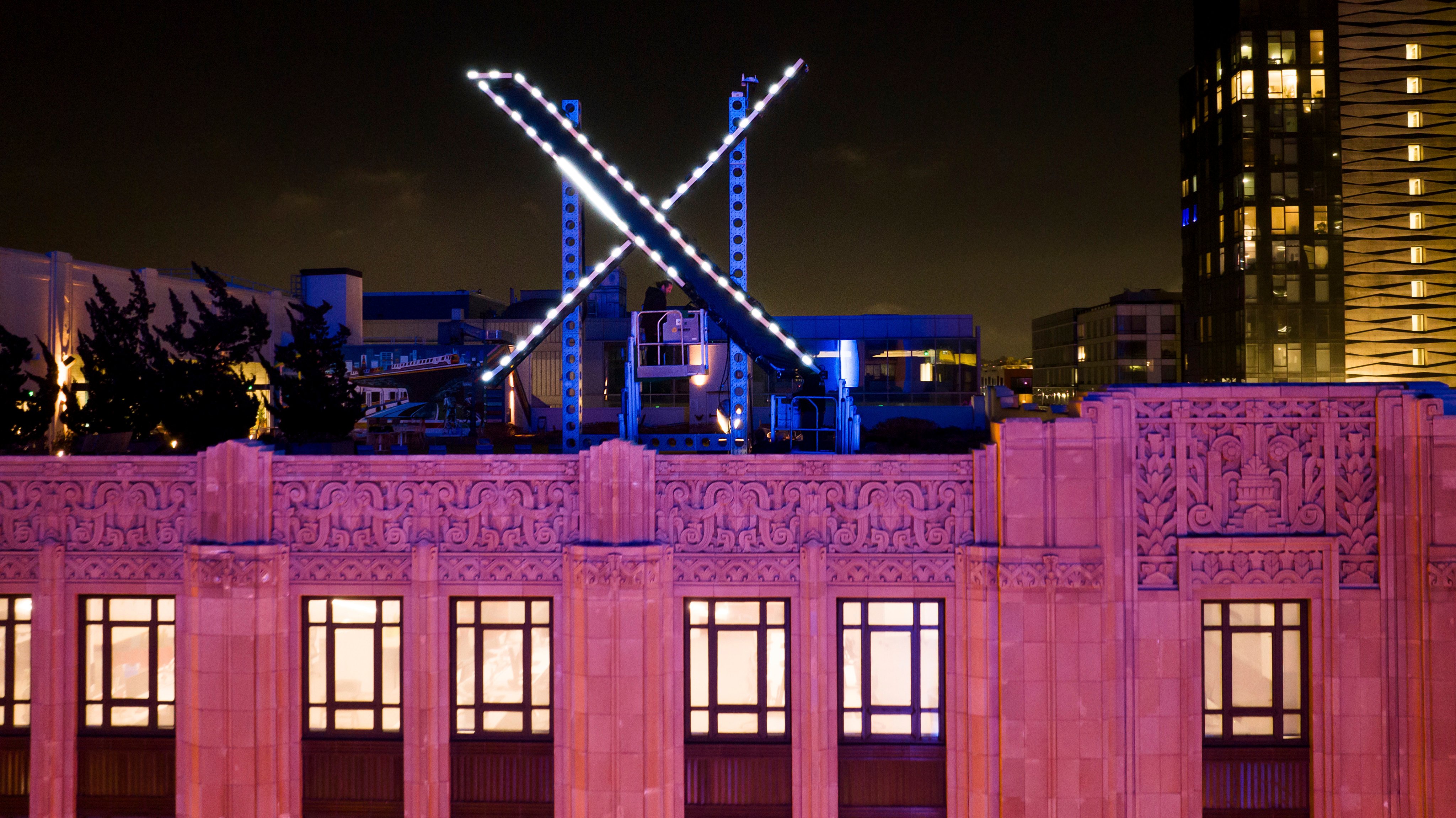 An “X” sign atop the company headquarters, formerly known as Twitter, in downtown San Francisco. Photo: AP Photo