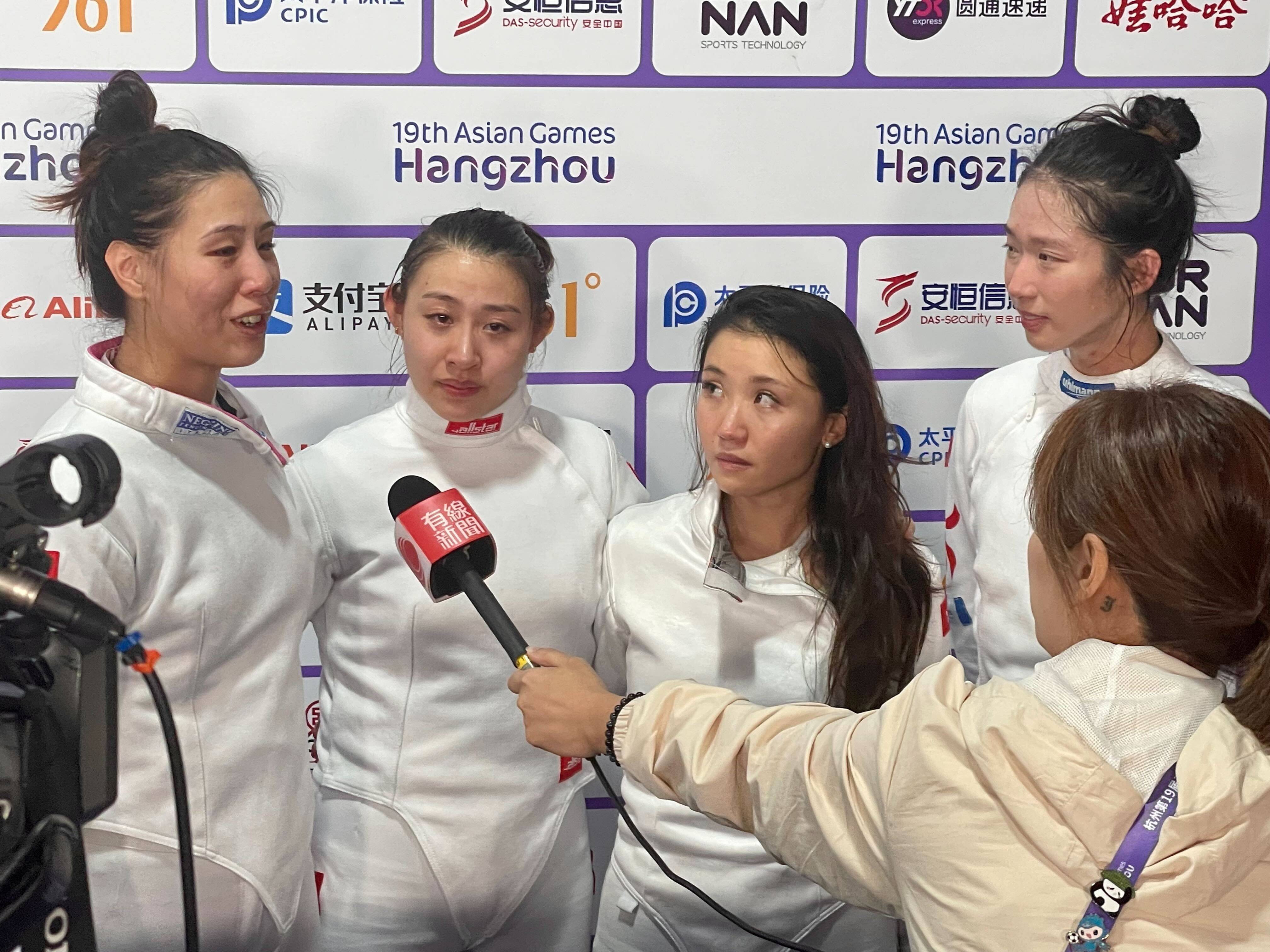 Hong Kong’s women’s epee team could not hold back their tears when giving live television interviews, after missing out on Asian Games gold. Photo: Mike Chan
