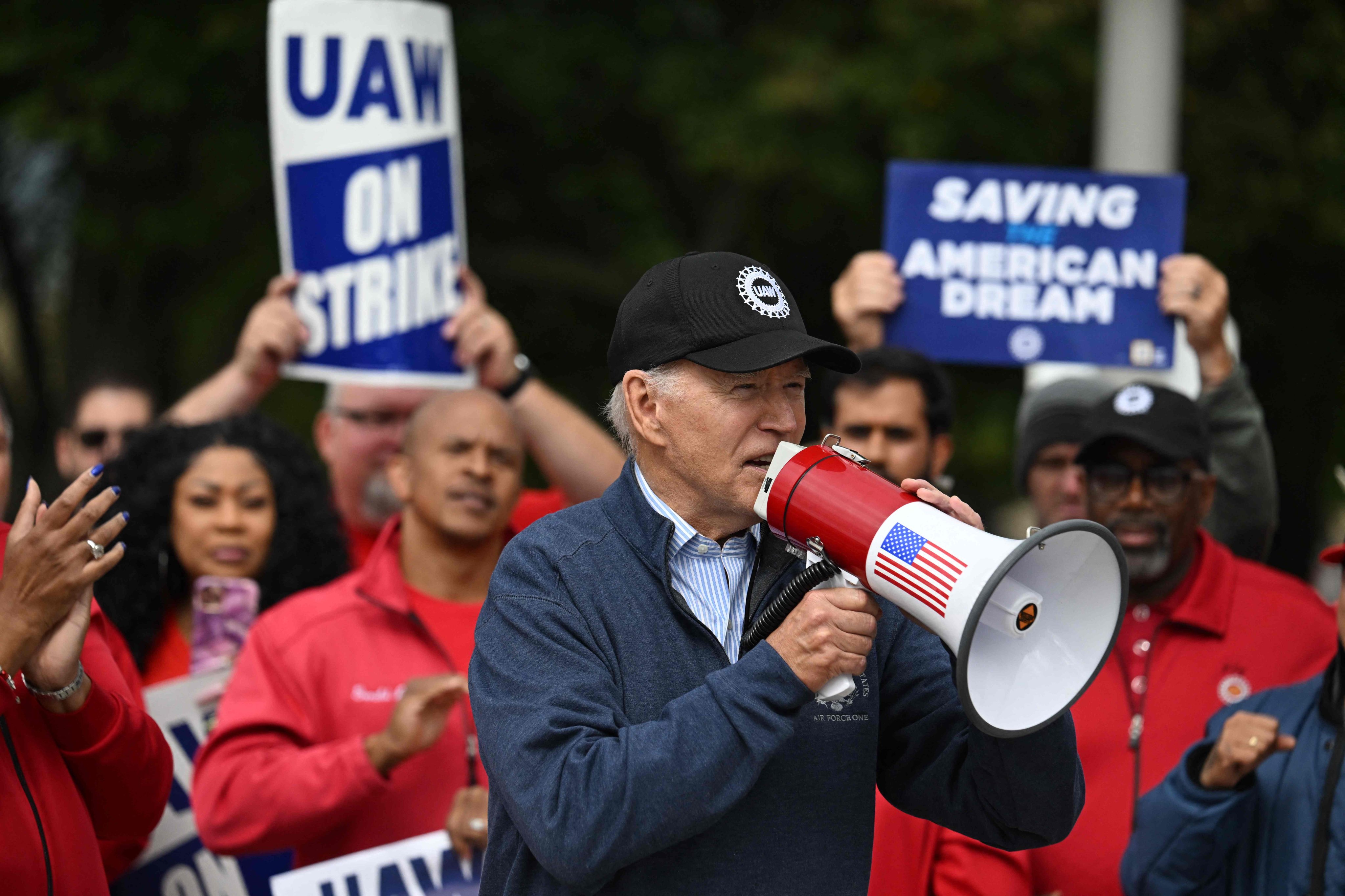 US President Joe Biden addresses striking members of the United Auto Workers union at a picket line outside a General Motors Service Parts Operations plant in Belleville, Michigan, on Tuesday. Photo: AFP