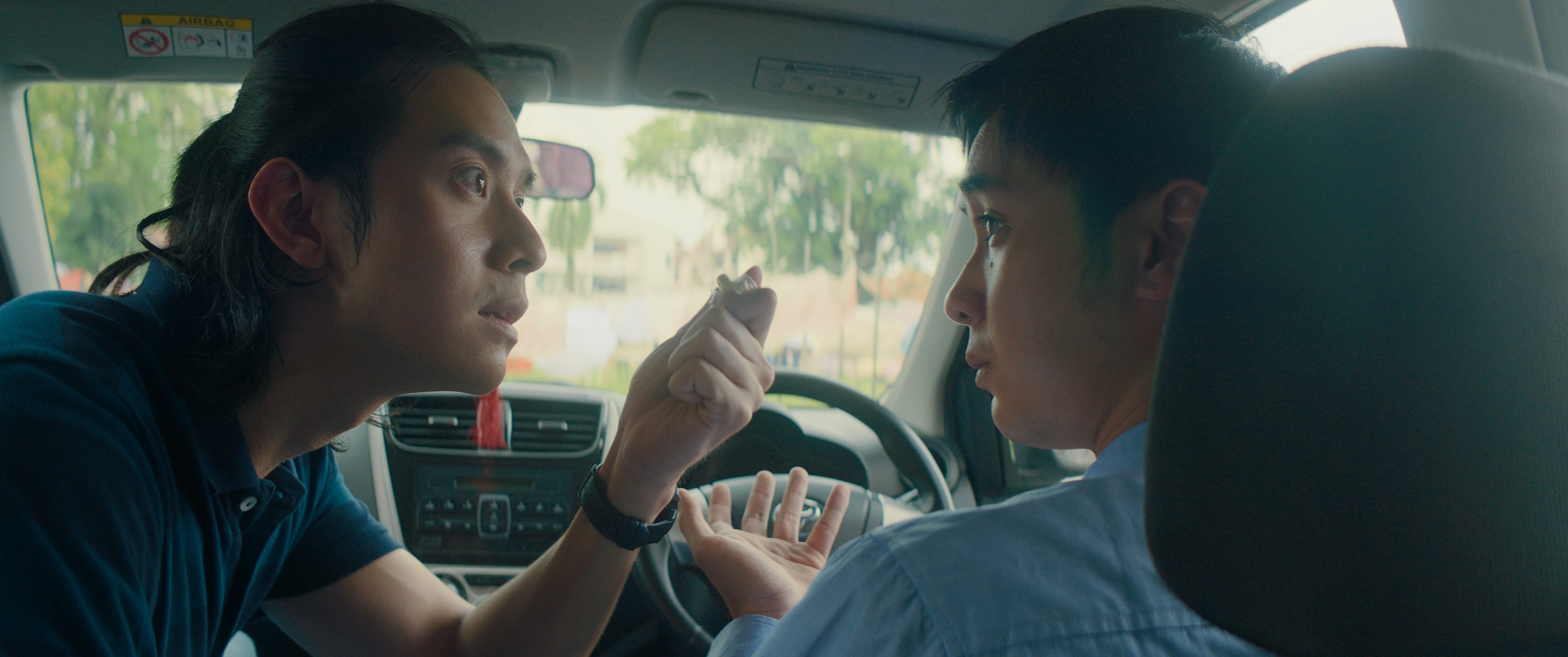 Wilson Lee (left) and Fabian Loo in a still from “Rain Town”. Photo: Current Pictures