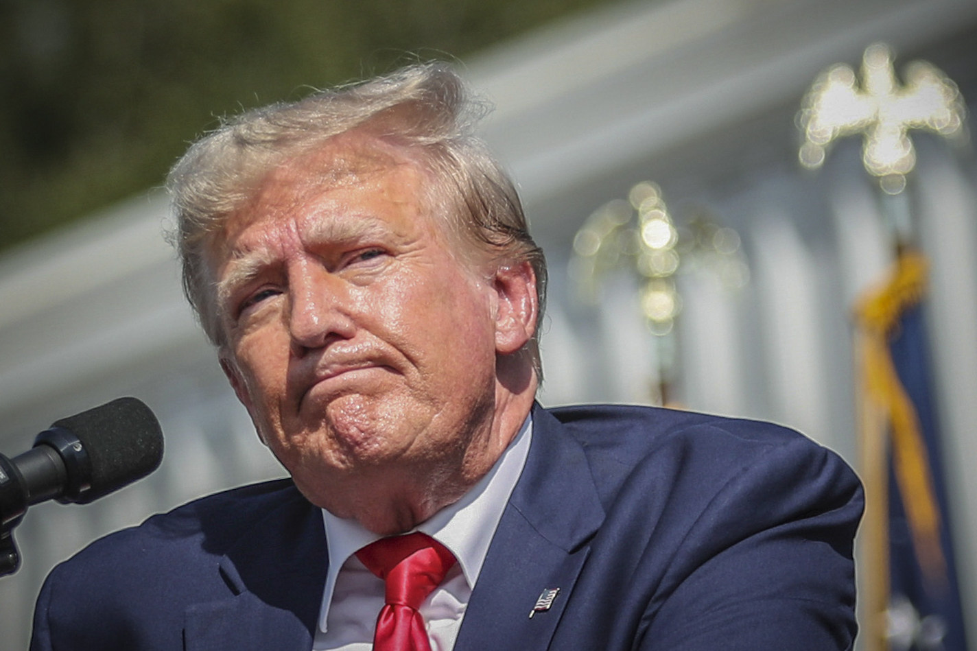 Former US president Donald Trump pauses before ending his remarks at a rally in Summerville, South Carolina, on Monday. Photo: AP