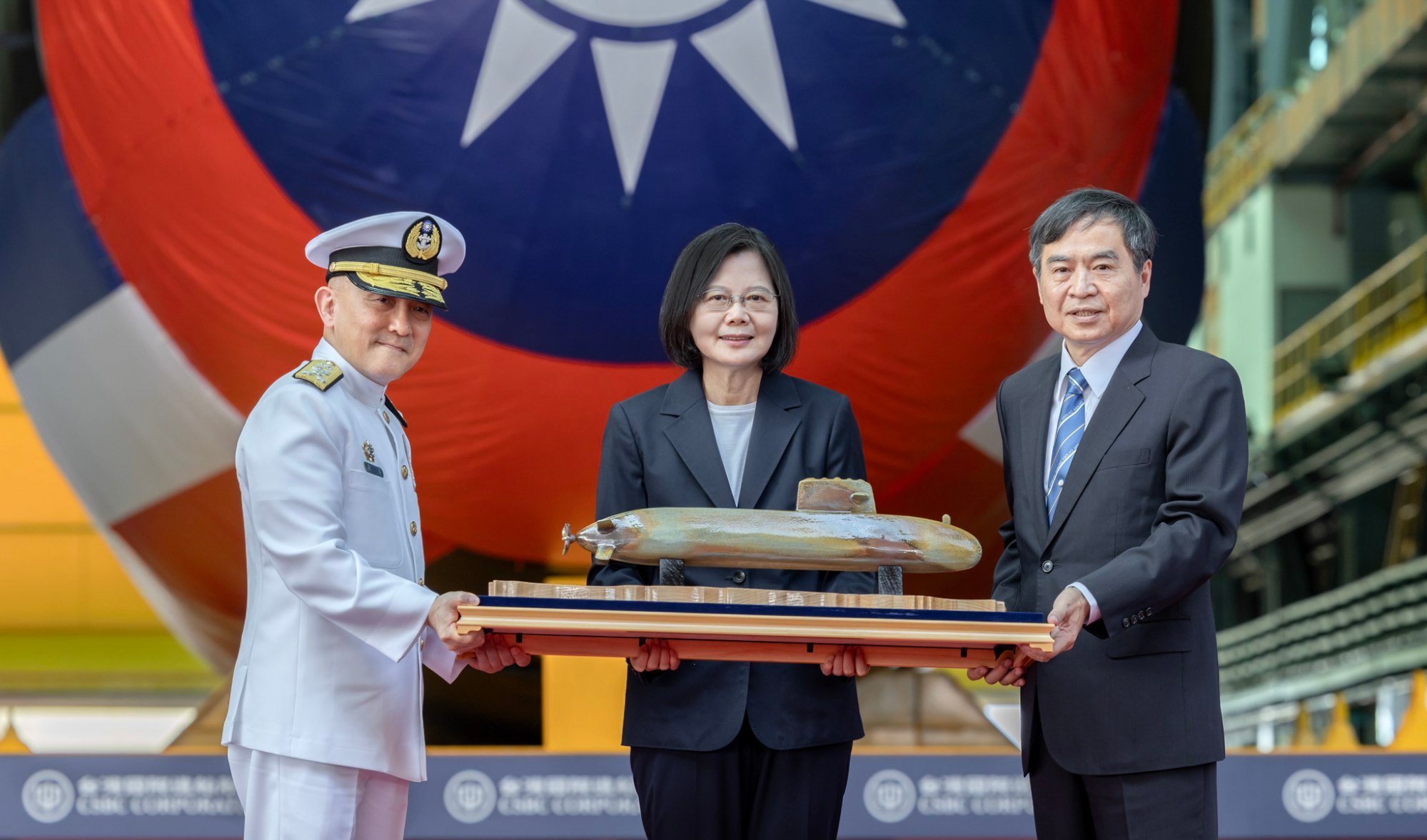 President Tsai Ing-wen poses with a model of a submarine. Photo: EPA-EFE