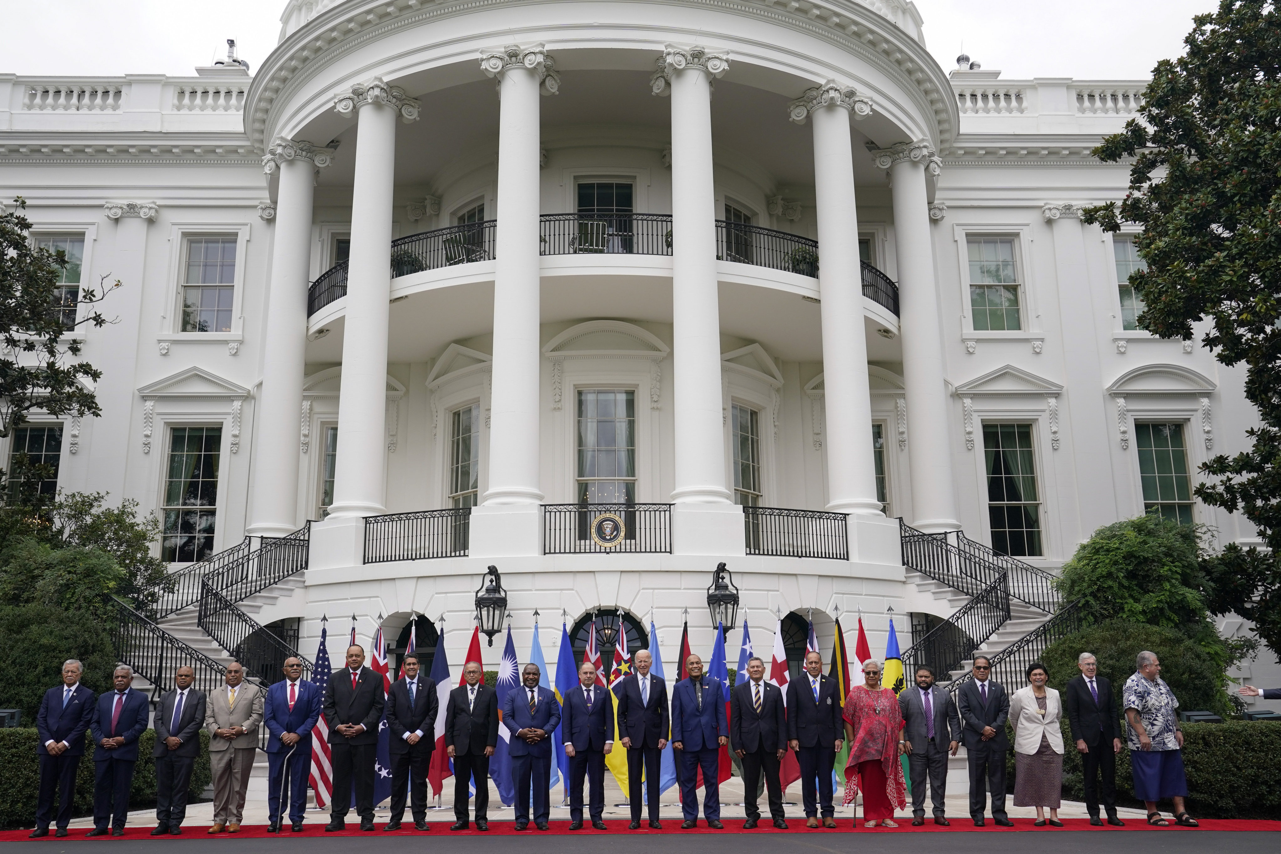 US President Joe Biden poses with leaders from the Pacific island nations during a summit in Washington on September 25. Photo: AP