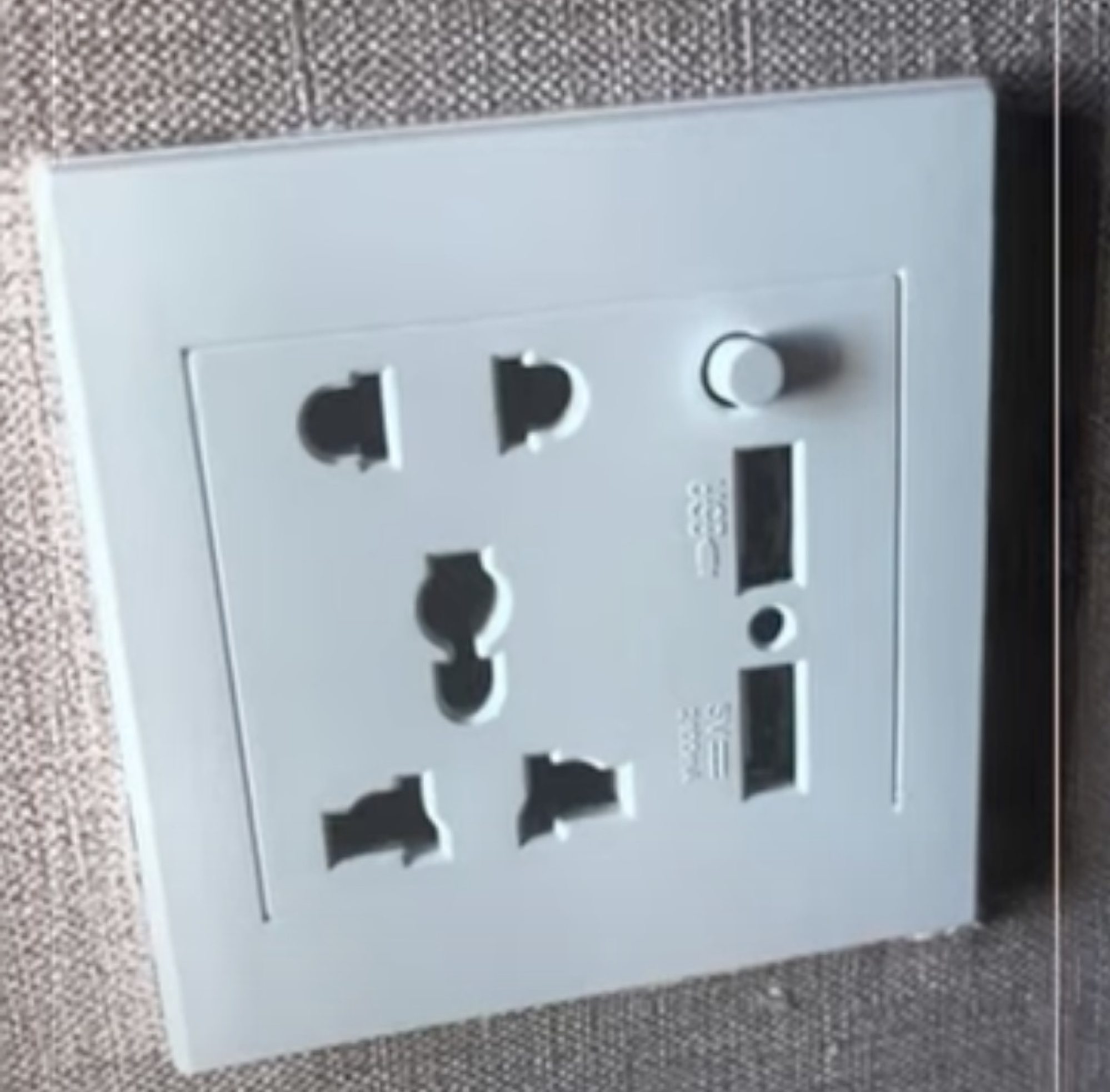 Security experts have advised people to use a torch light to make close-up inspections of sockets, walls and plugs. Photo: YouTube/@Oriental Daily News Malaysia