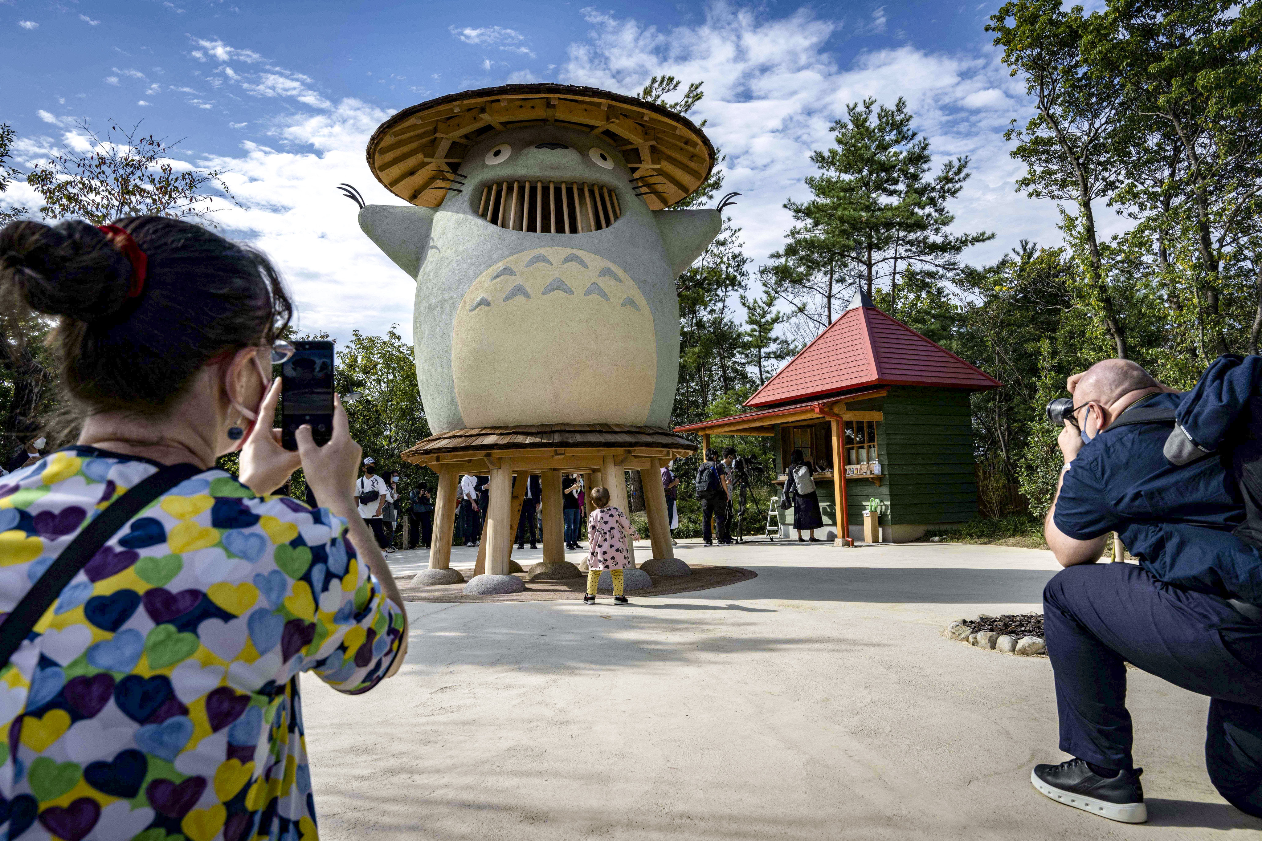 People take pictures of the ‘Totoro’ character at Ghibli Park in Aichi prefecture. Photo: Studio Ghibi/AFP