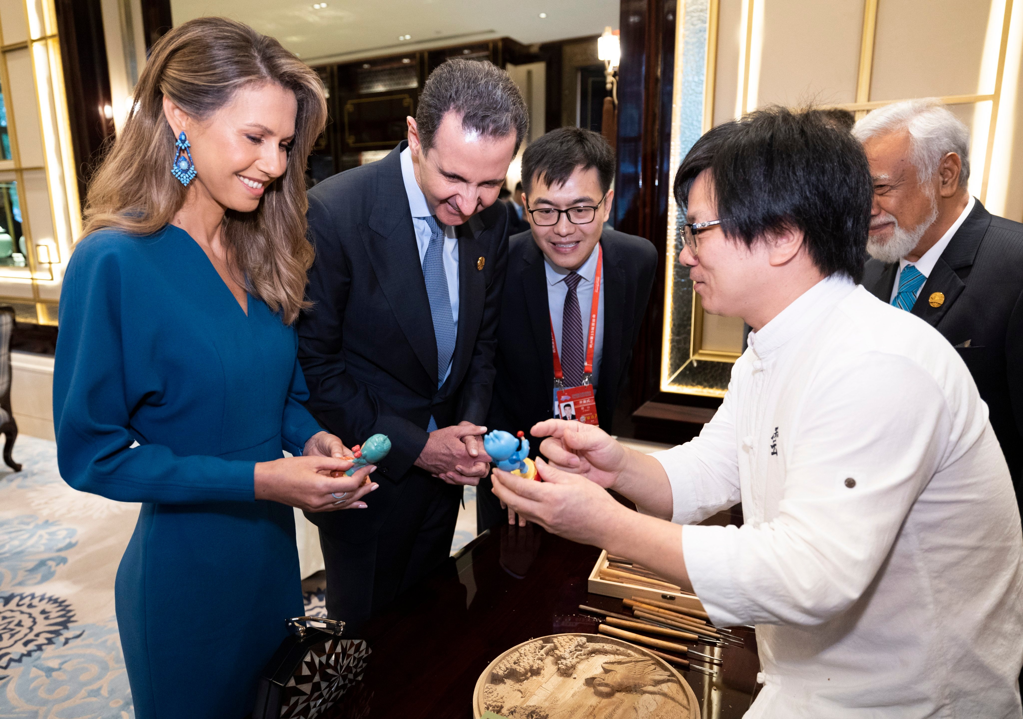 Syria’s first lady, Asma al-Assad, accompanies her husband on his first visit to China since the Syrian civil war started in 2011. Photo: EPA-EFE