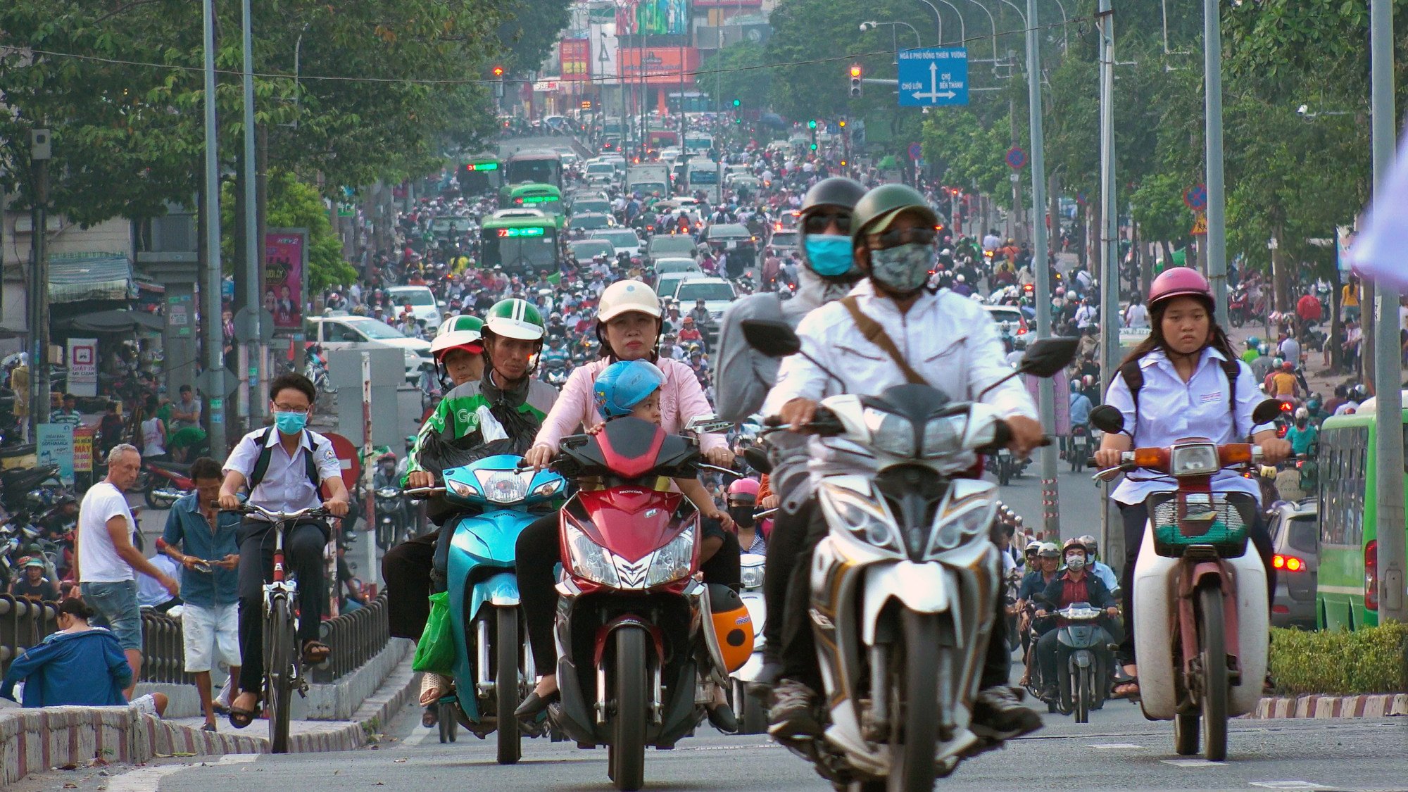 Rush hour traffic in Ho Chi Minh City. From Bangkok to Jakarta and Ho Chi Minh City, streets now bristle round-the-clock with the distinctive company jackets of the delivery services. Photo: Shutterstock