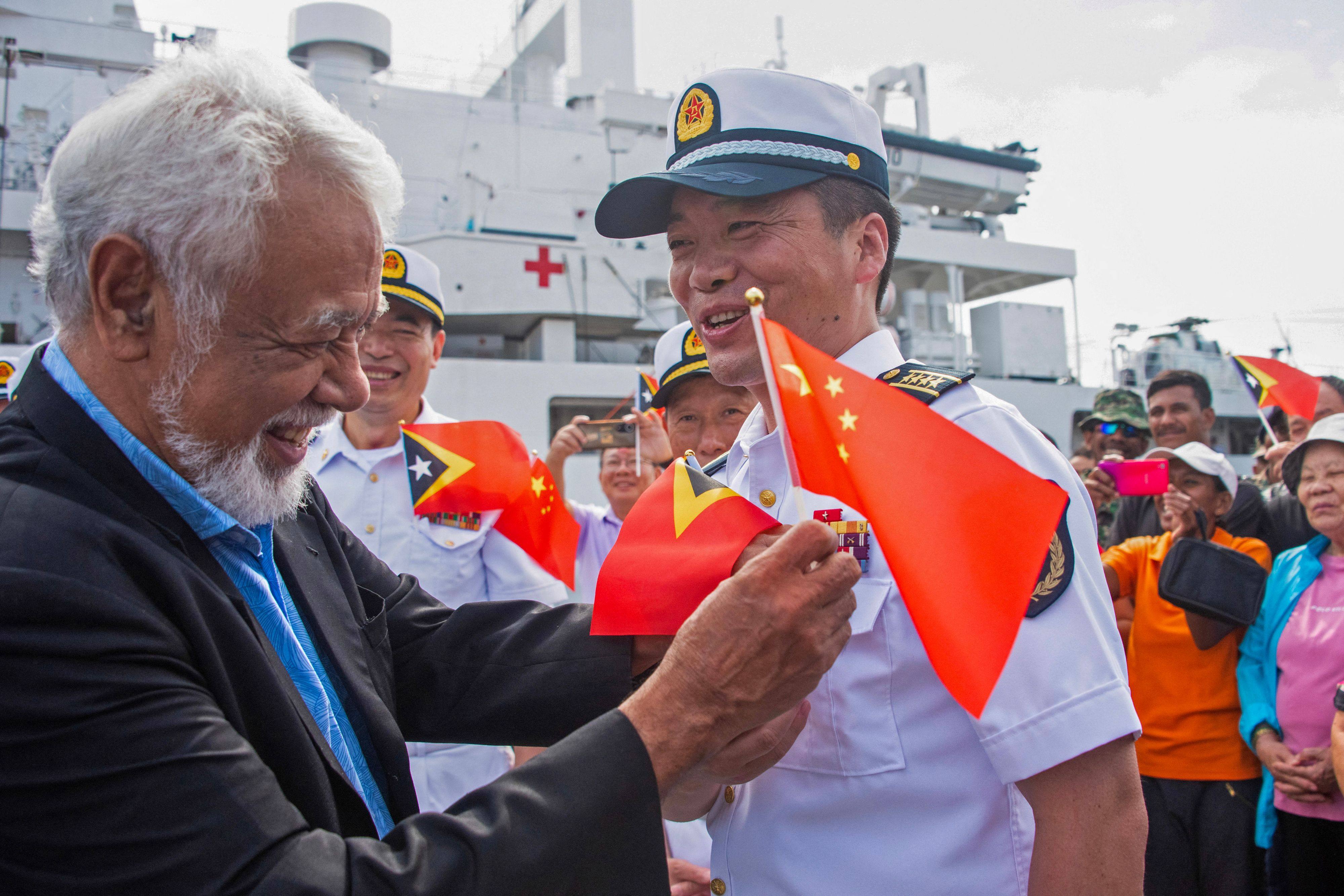 East Timor’s Prime Minister Xanana Gusmao (left) receives Rear Admiral Zhao Guangqing, the commander of a Chinese naval hospital ship, which is anchored in Dili harbor on a humanitarian mission. Photo: AFP