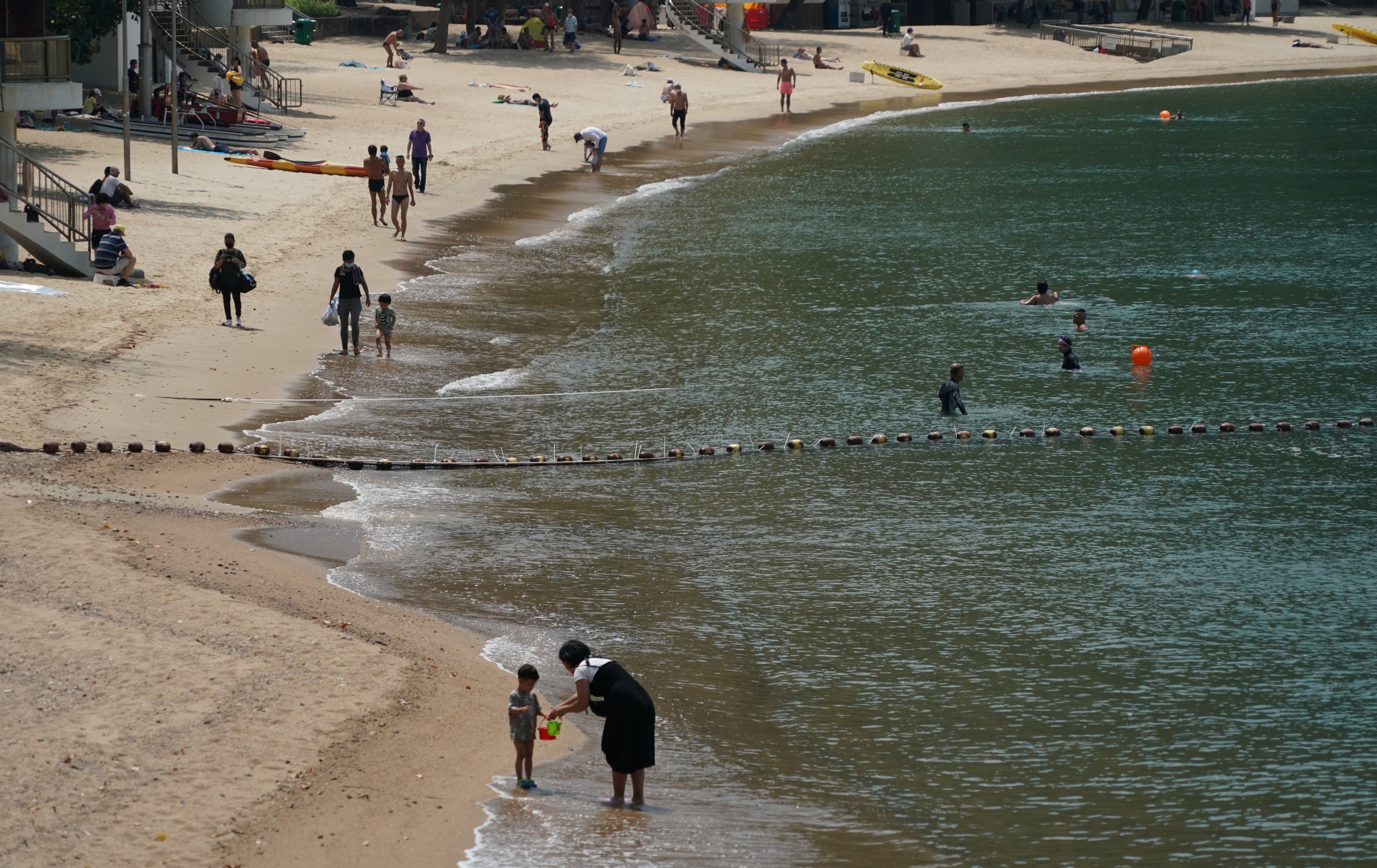 Residents enjoy the sun and sea at Deep Water Bay on May 5, 2022. Photo: Felix Wong