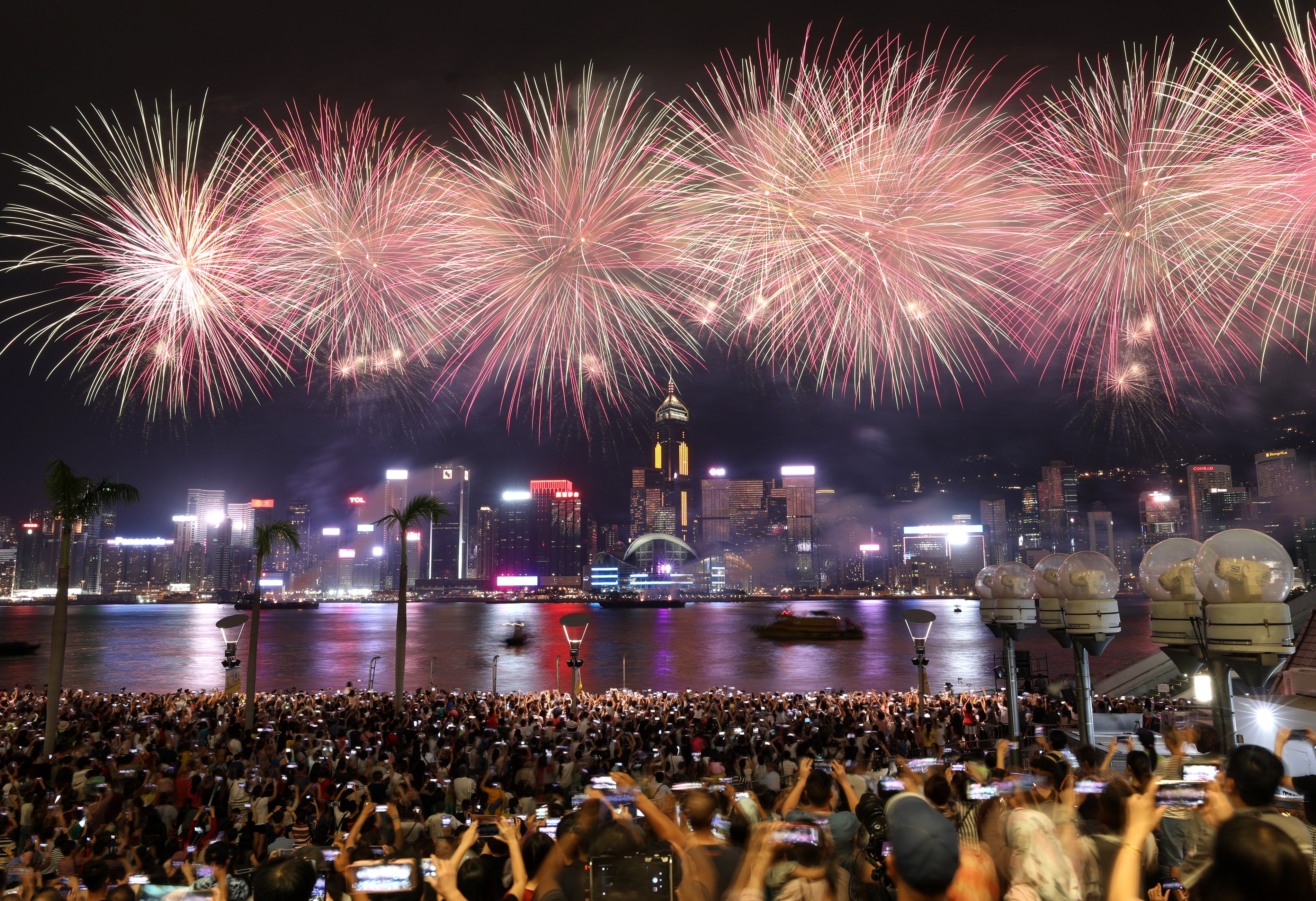 Fireworks over Hong Kong on Sunday are expected to brighten the night for the restaurant trade. Photo: Dickson Lee