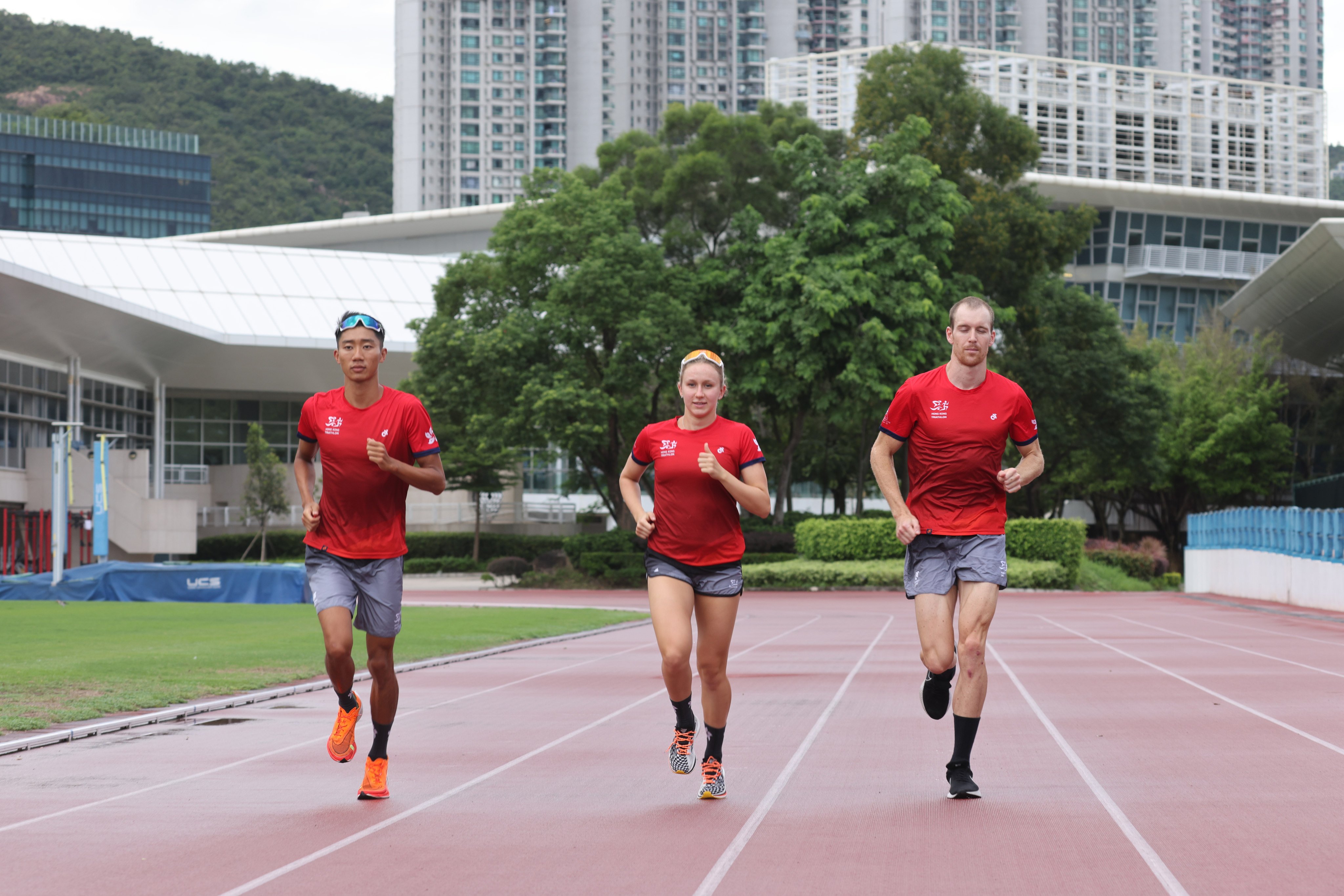 Hong Kong’s Oscar Coggins (right) will no longer participate in the triathlon mixed relay. Photo: Yik Yeung-man