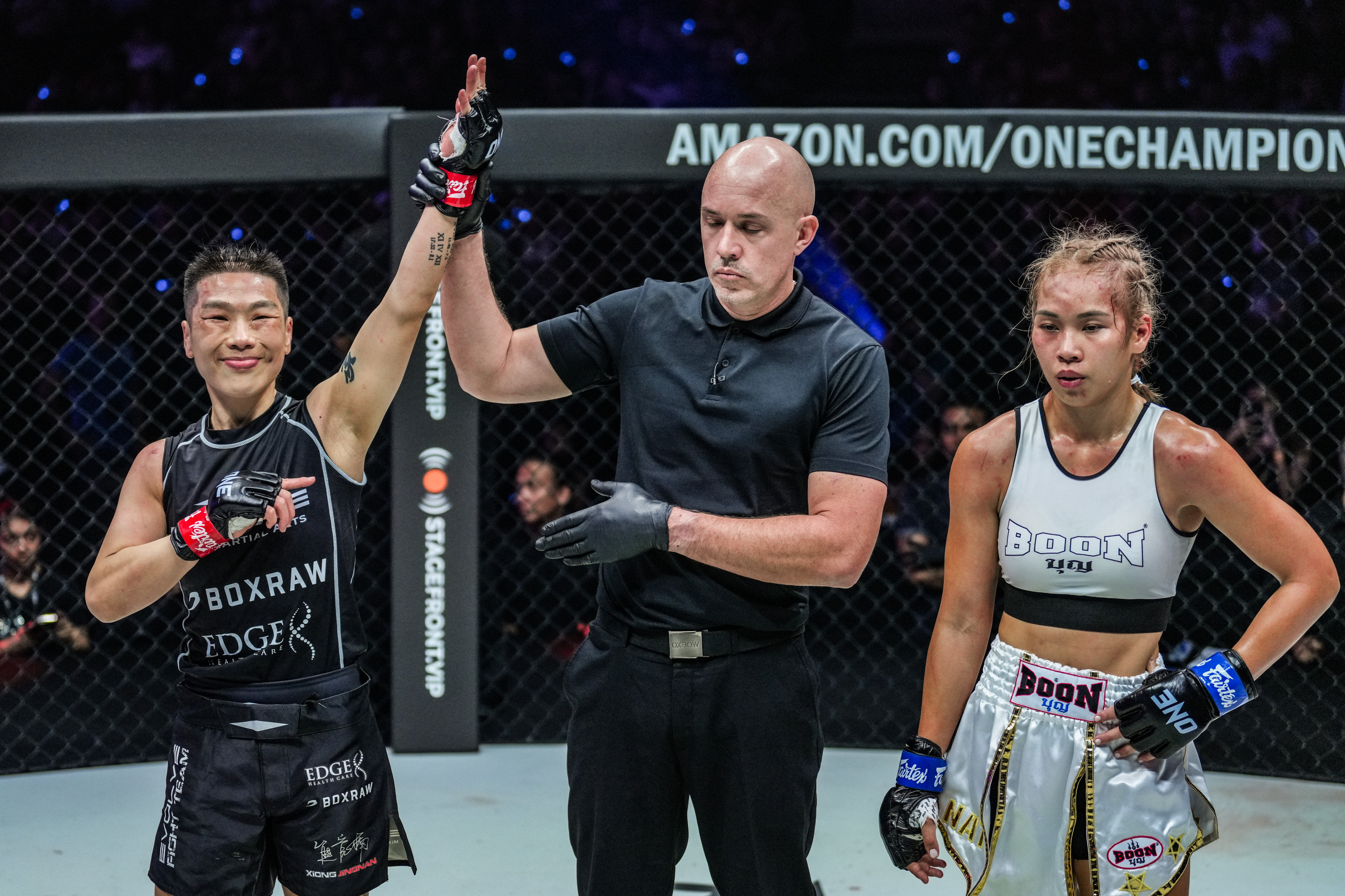 Xiong Jingnan celebrates after beating Wondergirl in their special rules striking clash. Photos: ONE Championship