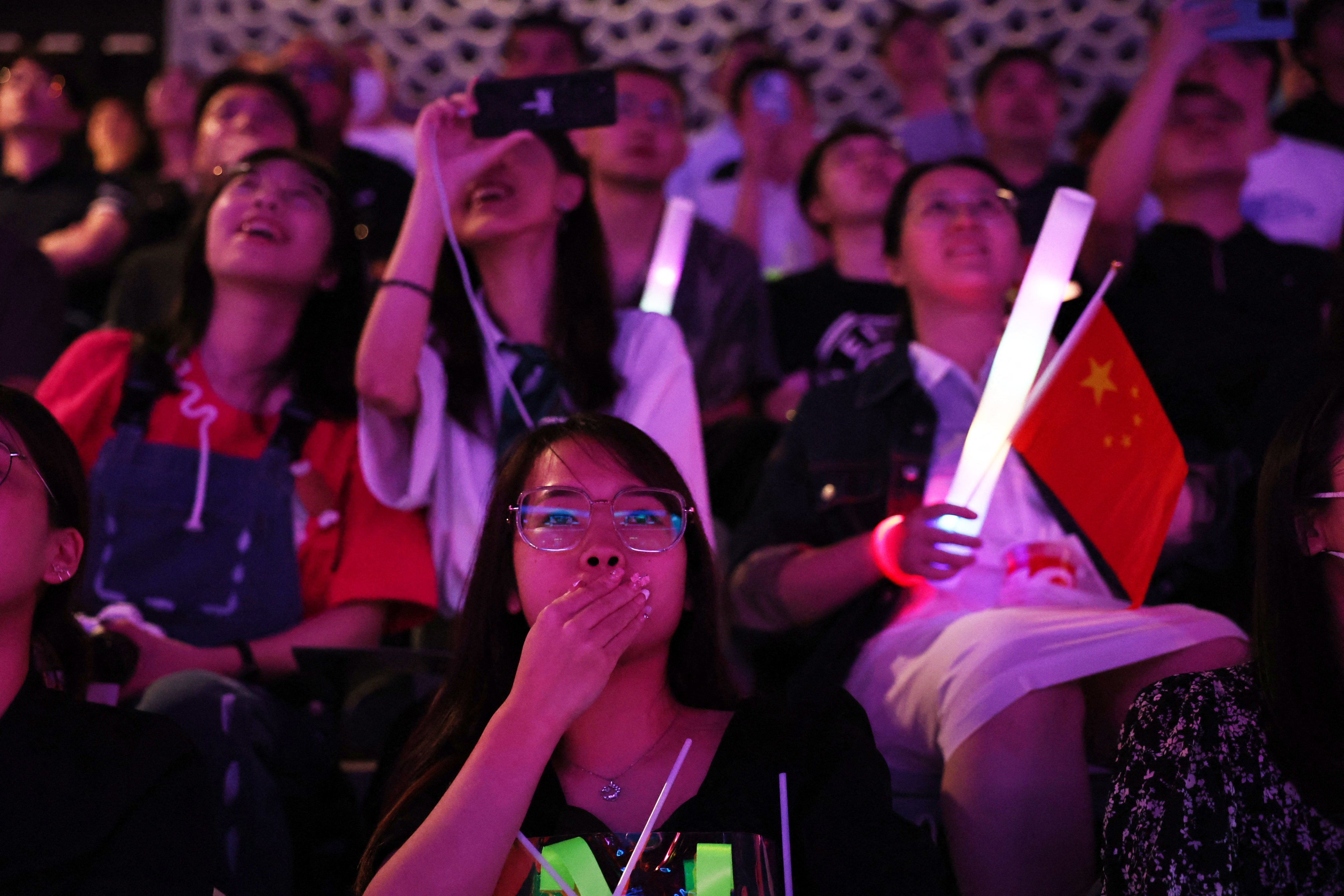 Fans watch the Arena of Valor Asian Games final at the venue in Hangzhou on September 26, 2023. Photo: Reuters