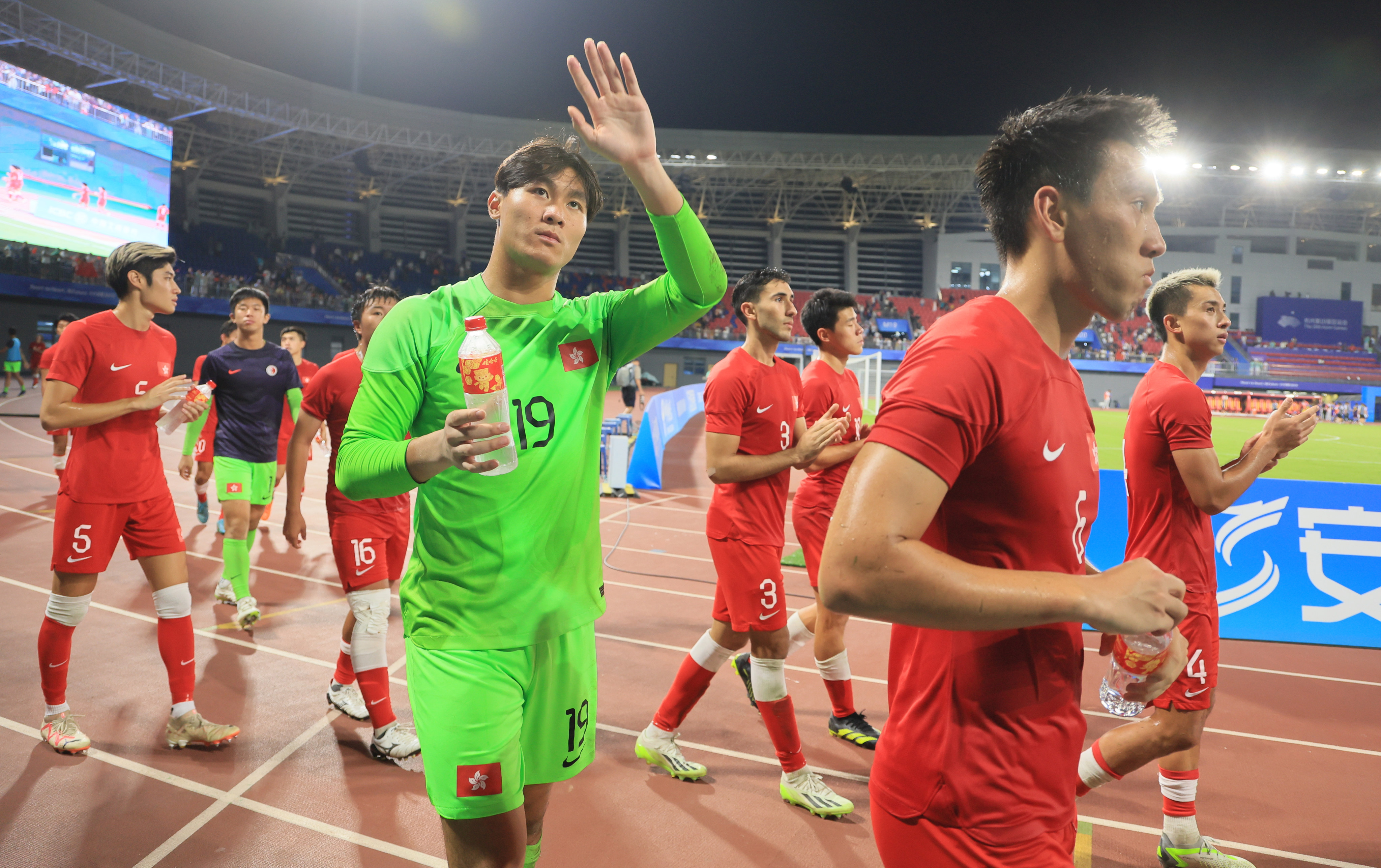 Hong Kong’s players are applauded at Xiaoshan Sports Centre Stadium after their semi-final loss. Photo: Dickson Lee
