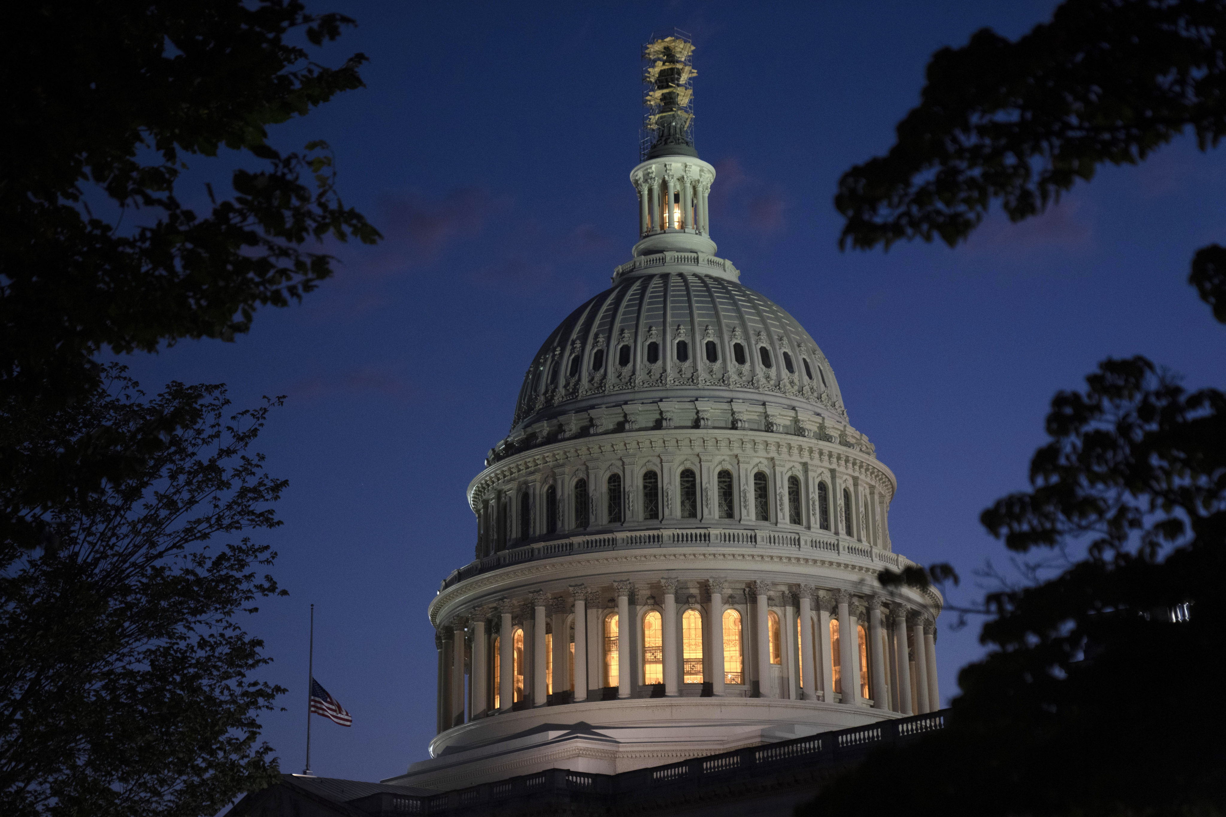 Night falls on the dome of the US Capitol hours after congressmn Kevin McCarthy was ousted as speaker of the House on Tuesday. Photo: AP