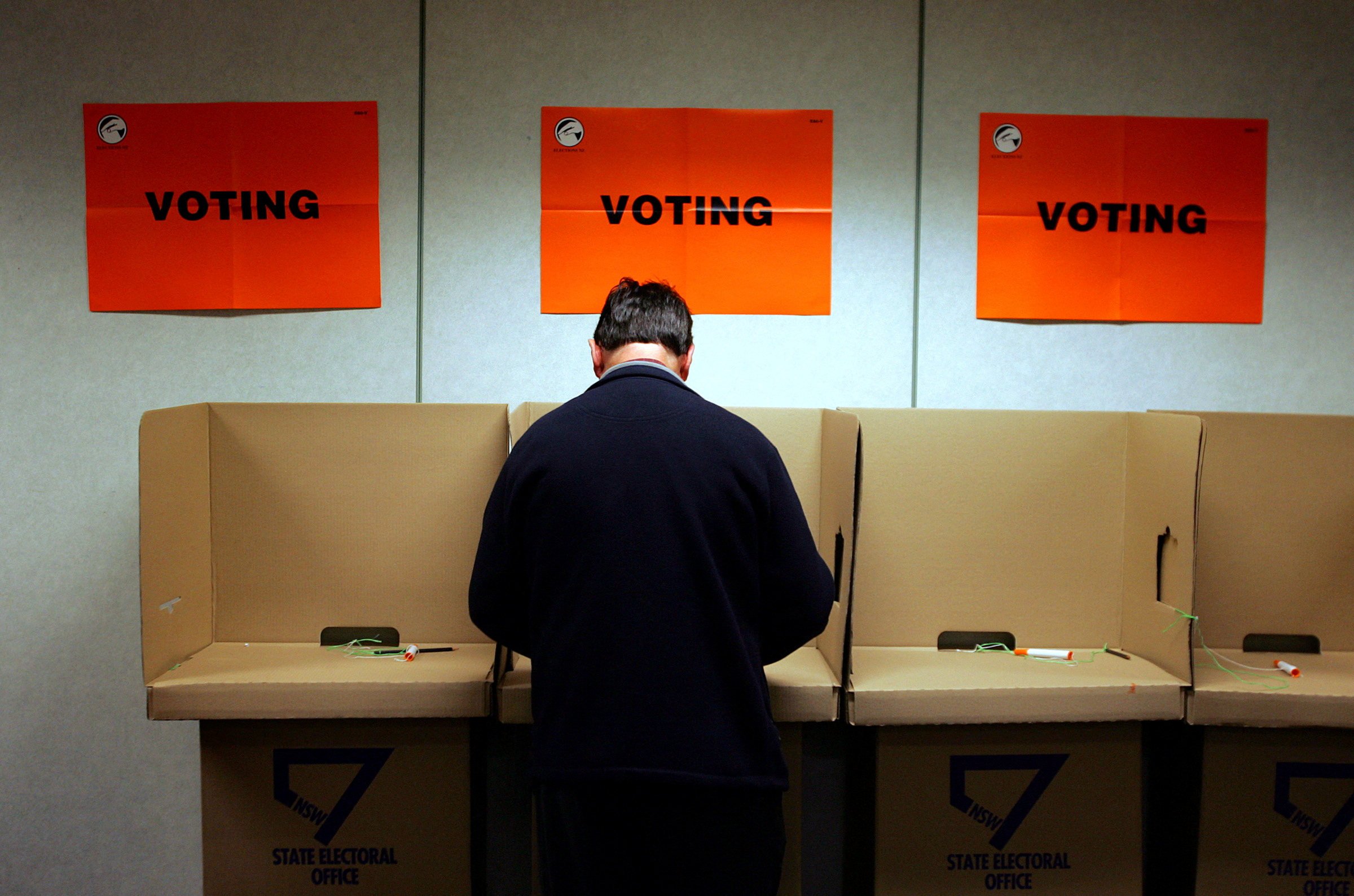 A New Zealander votes in a previous election at an overseas polling station in Sydney. Photo: Reuters 