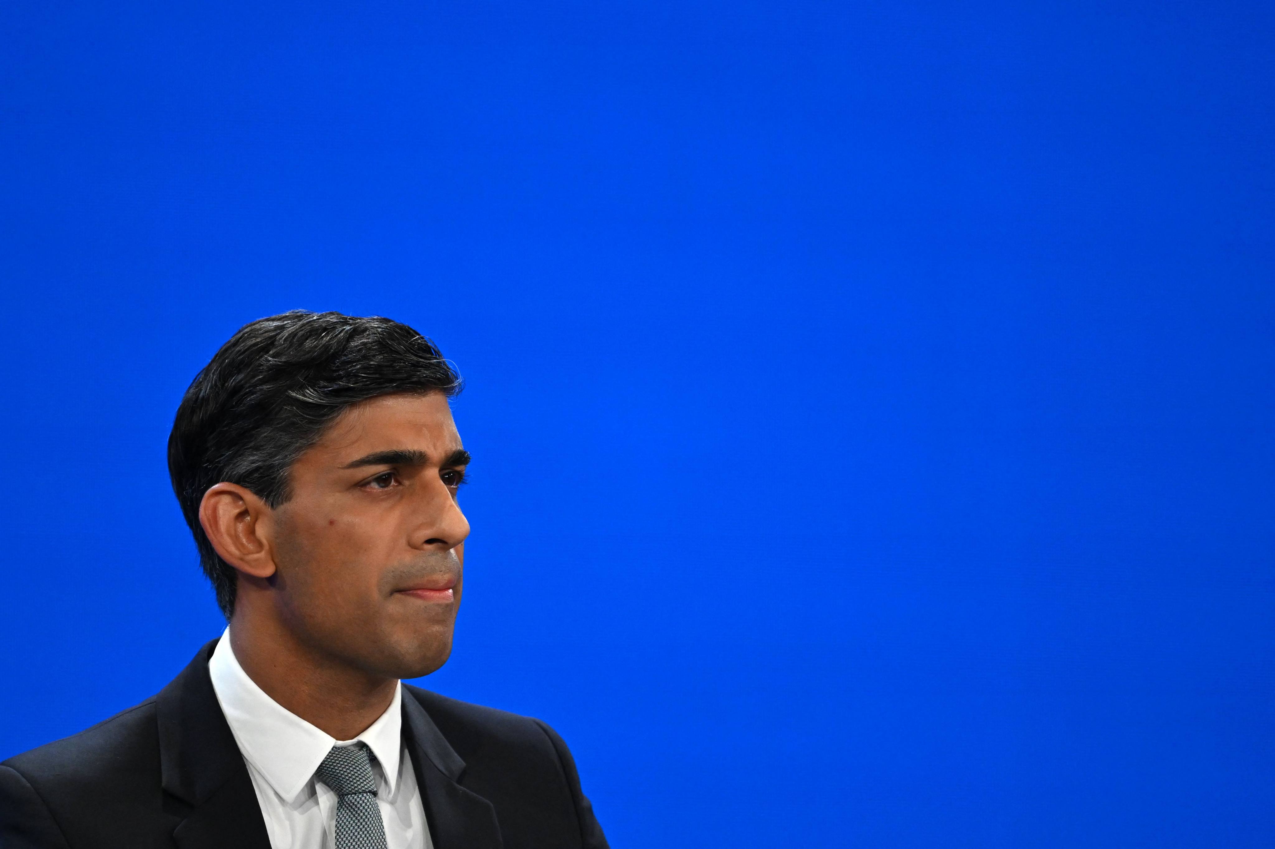 Britain’s Prime Minister Rishi Sunak addresses delegates at the annual Conservative Party Conference in Manchester. Photo: AFP