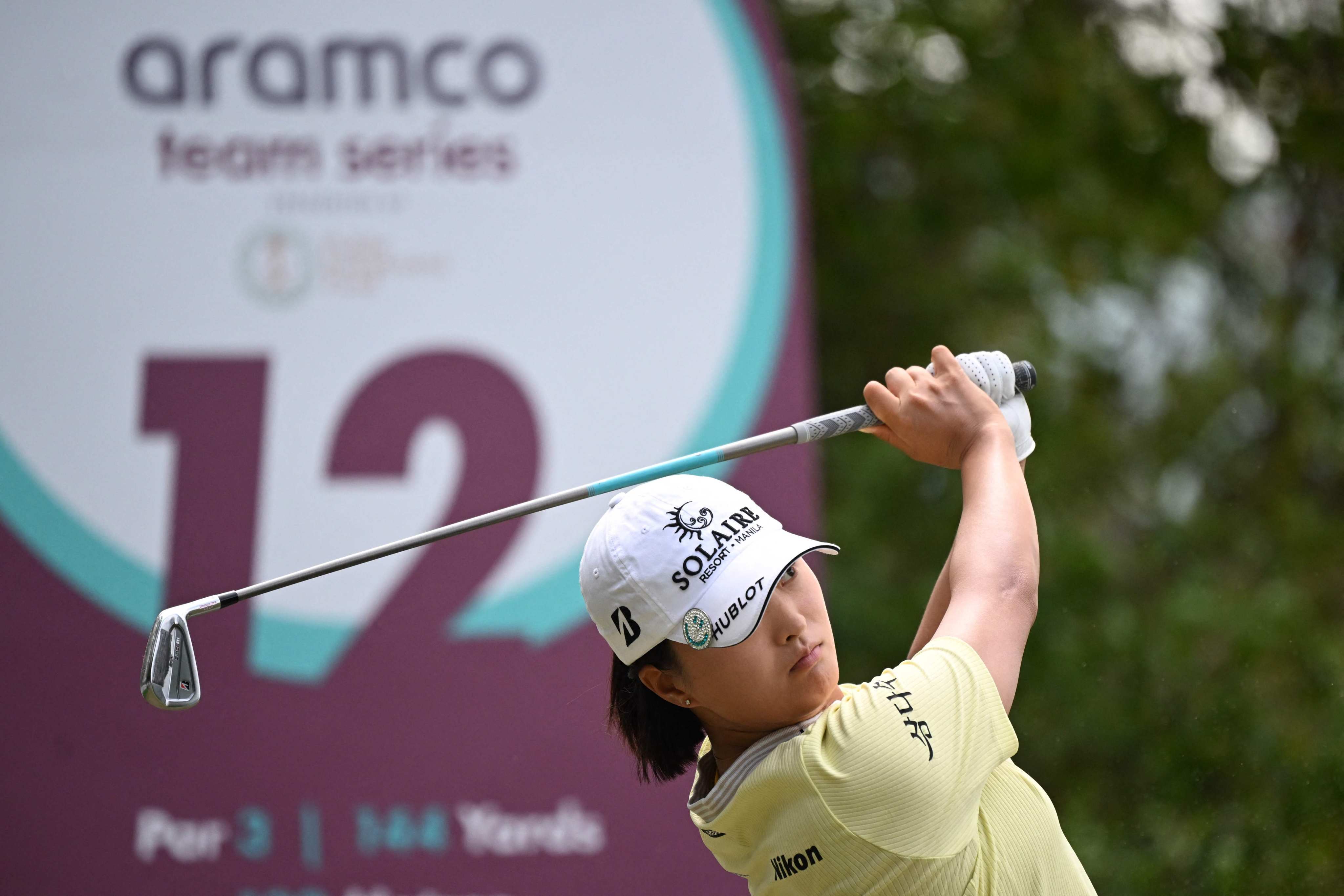 Ko Jin-young of South Korea hits a tee shot on day one of the Aramco Team Series at Hong Kong Golf Club. Photo: AFP