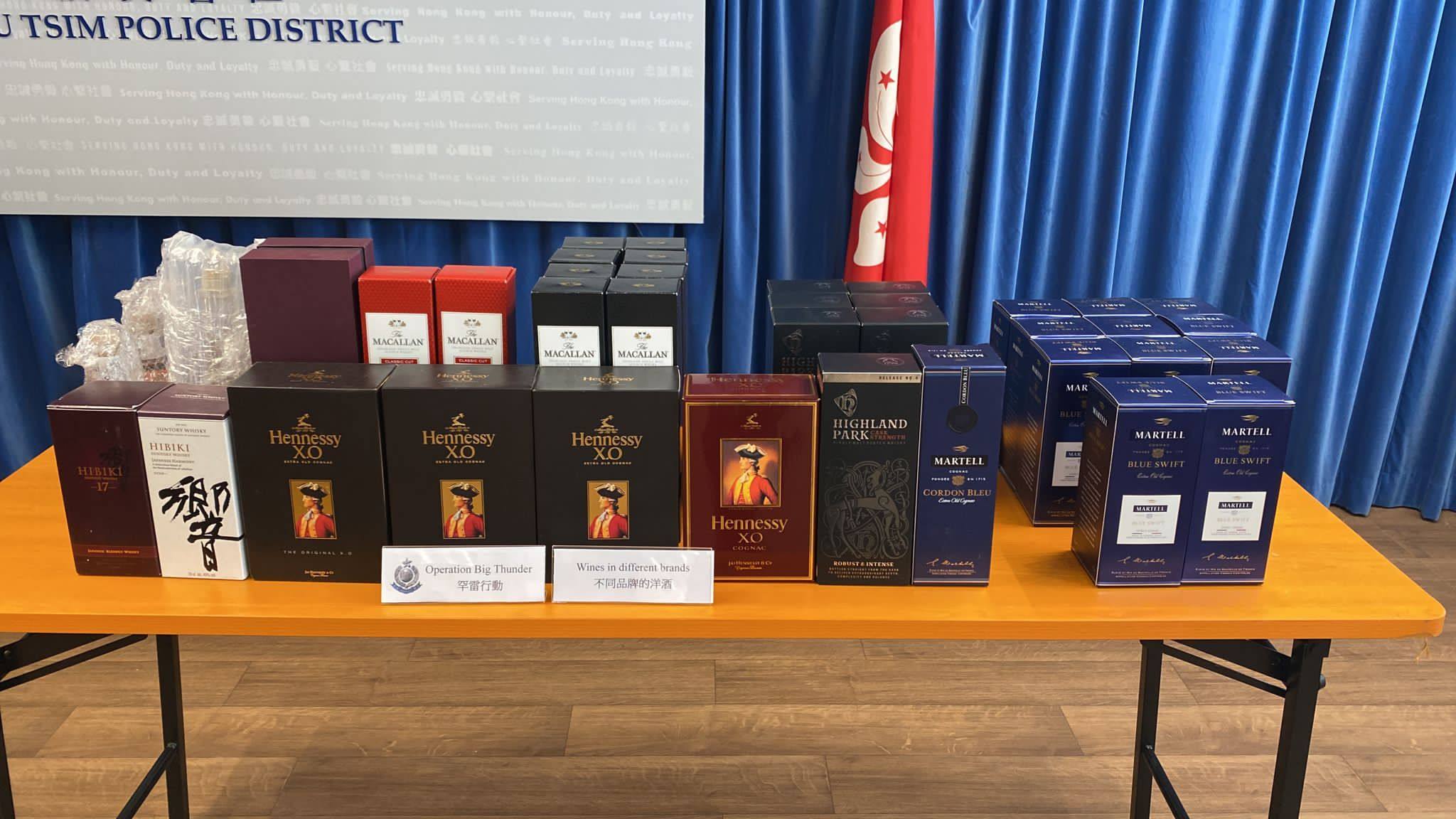 Some of the high-end alcohol seized in Operation Big Thunder, a police sting targeting aircraft credit card thefts. Photo: Handout