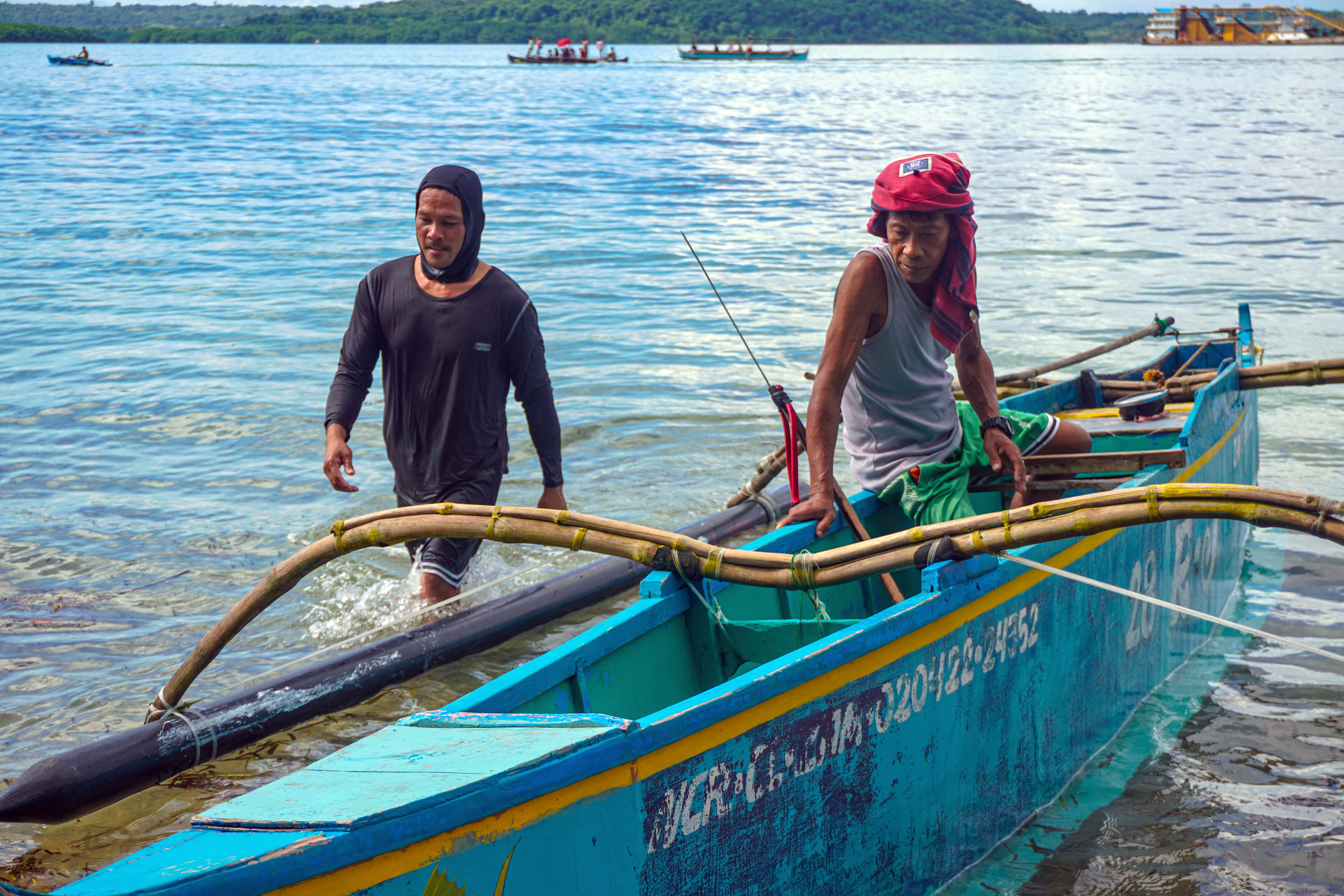 Rony Drio and Jay-ar Ermita are long-time friends and spearfish together along the municipal waters of San Salvador. Photo: Shirin Bhandar