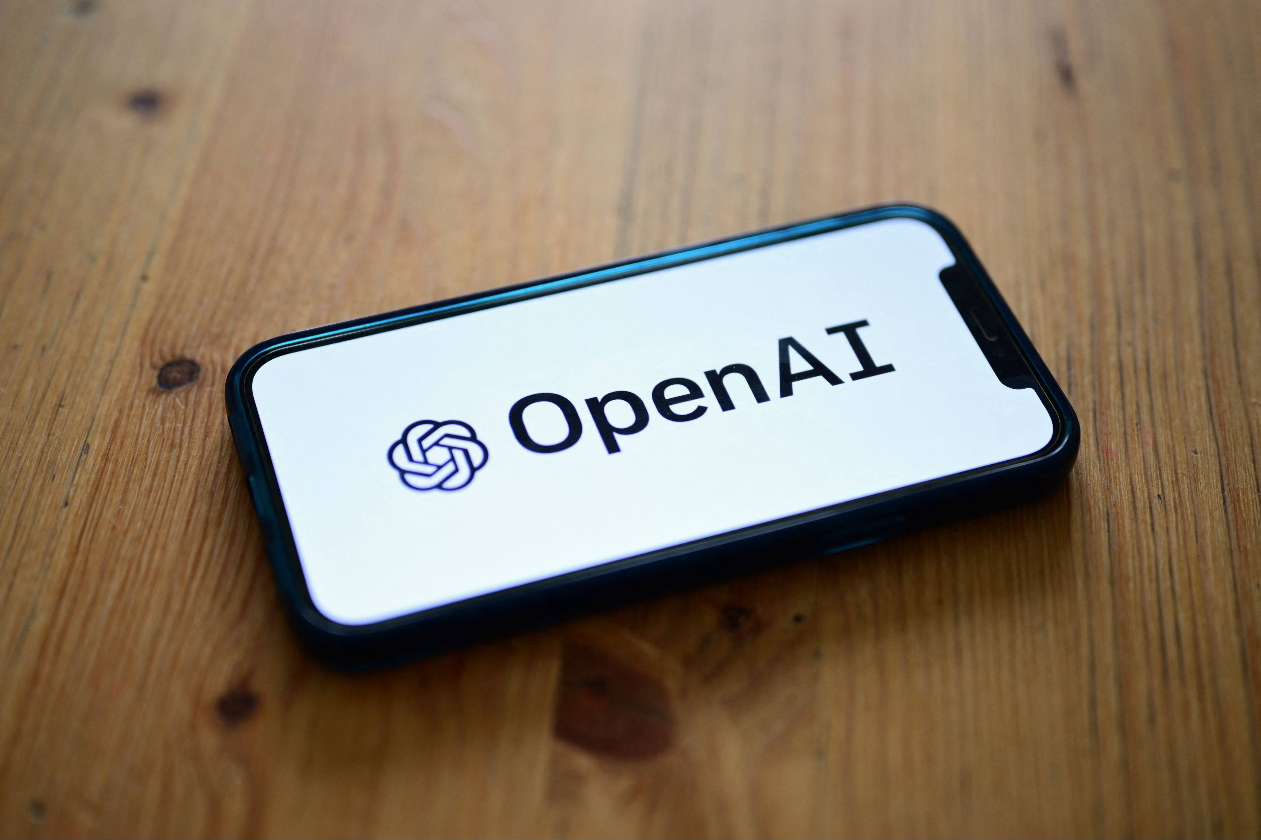 A smartphone displaying the OpenAI logo on October 4, 2023. Photo: AFP