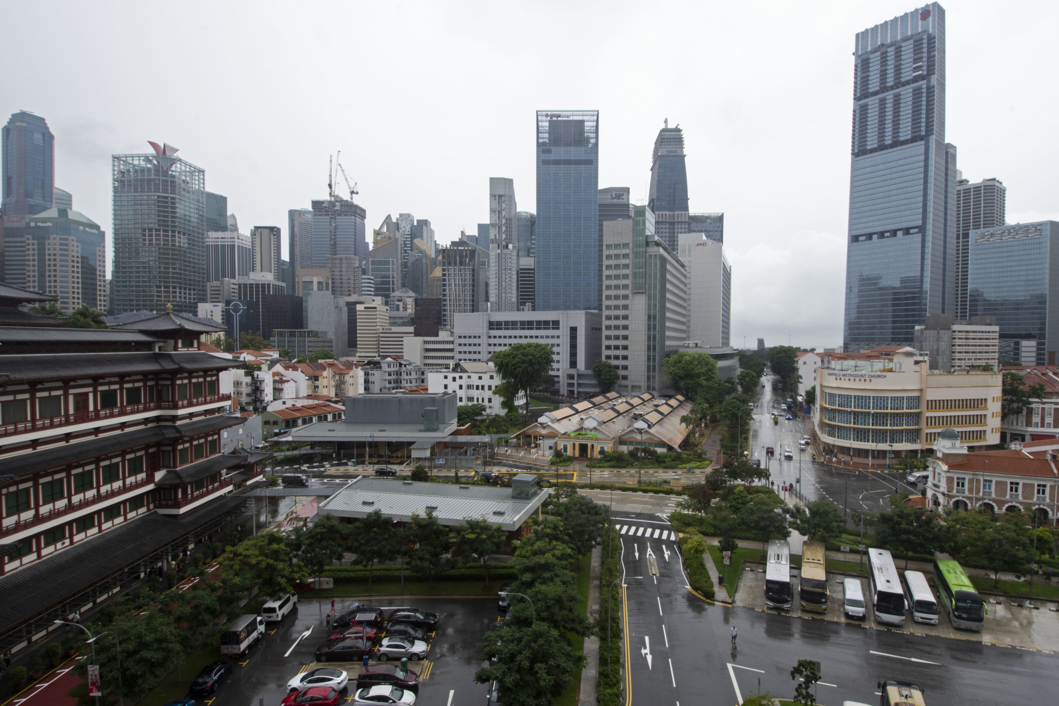 Singapore’s central business district. A 20-year-old man was jailed for sexually assaulting two young girls. Photo: Xinhua