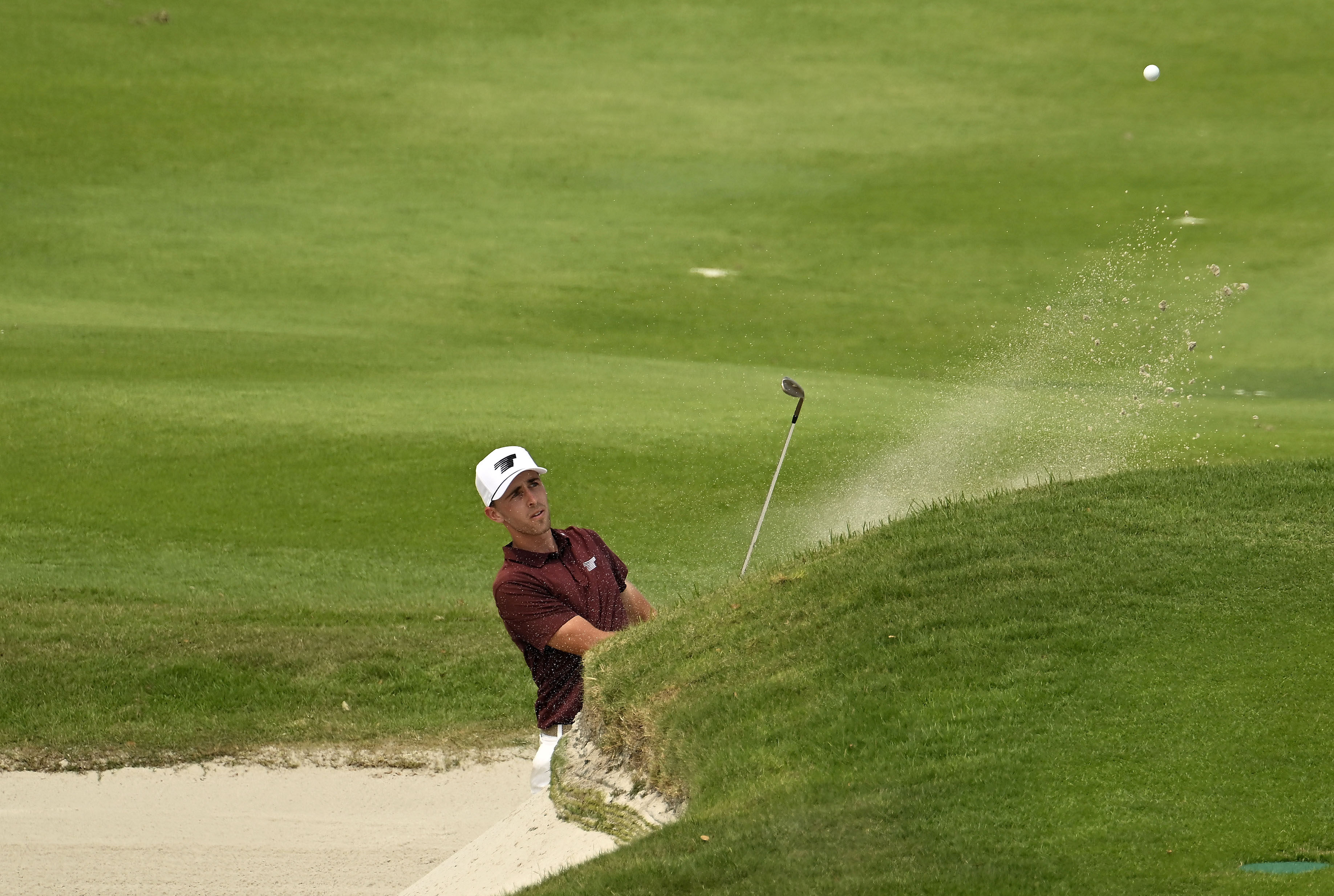 SINGAPORE: David Puig chips out of a bunker during the third round of the International Series Singapore at the Tanah Merah Country Club. Photo: Asian Tour
