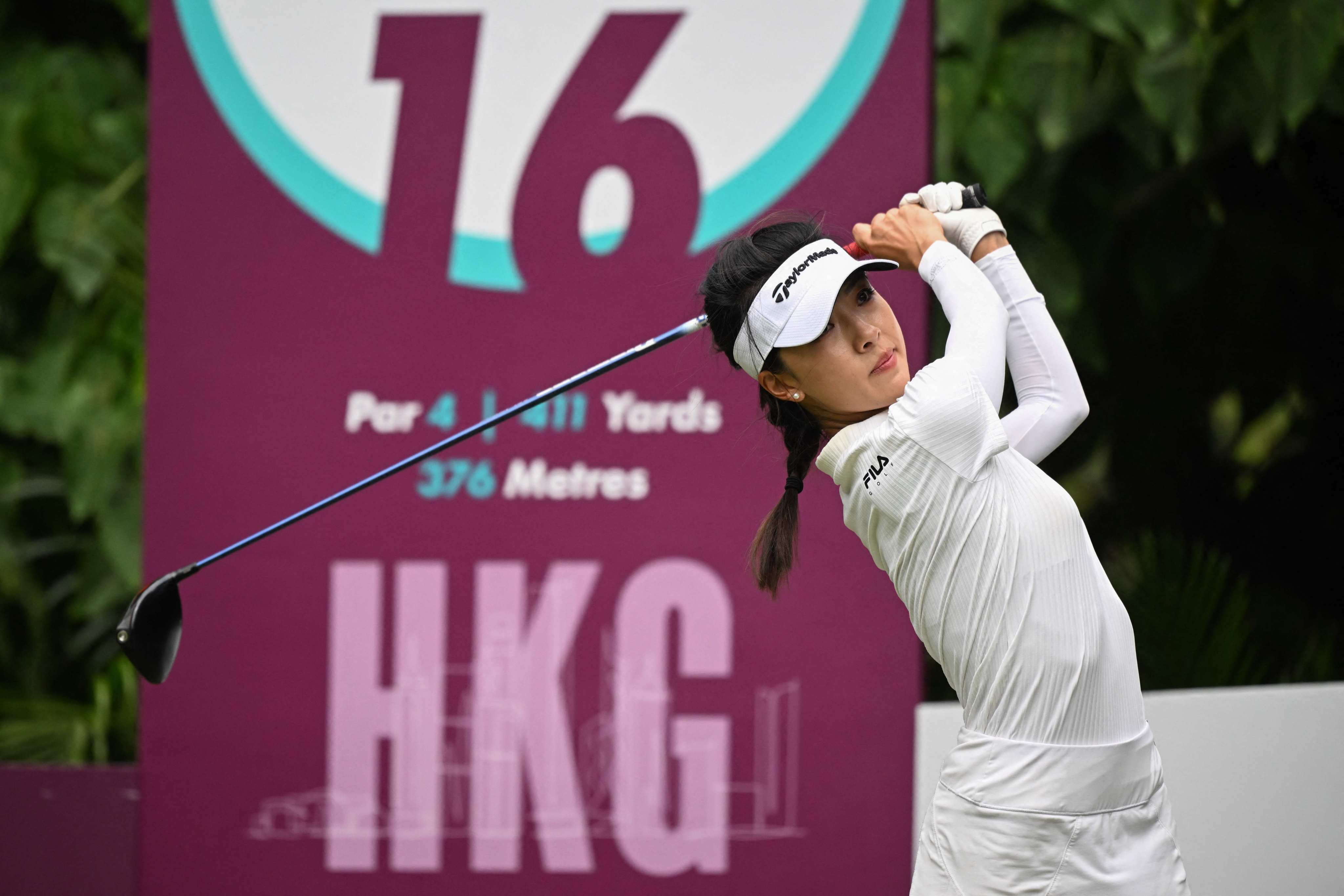 China’s Muni He tees off on day one of the Aramco Team Series tournament at the Hong Kong Golf Club. Photo: AFP