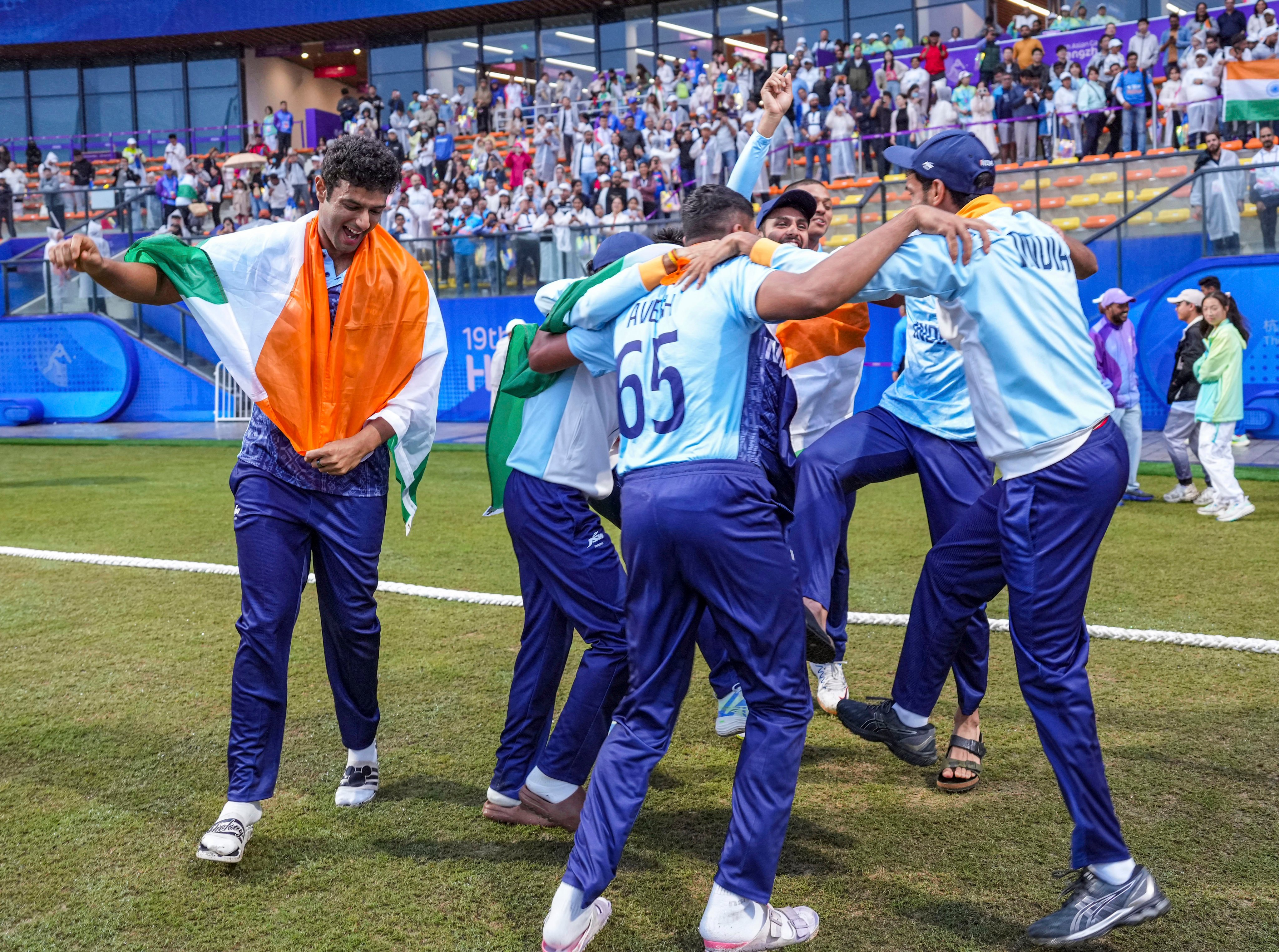 India players celebrate winning gold after rain washed out their final against Afghanistan. Photo: Xinhua
