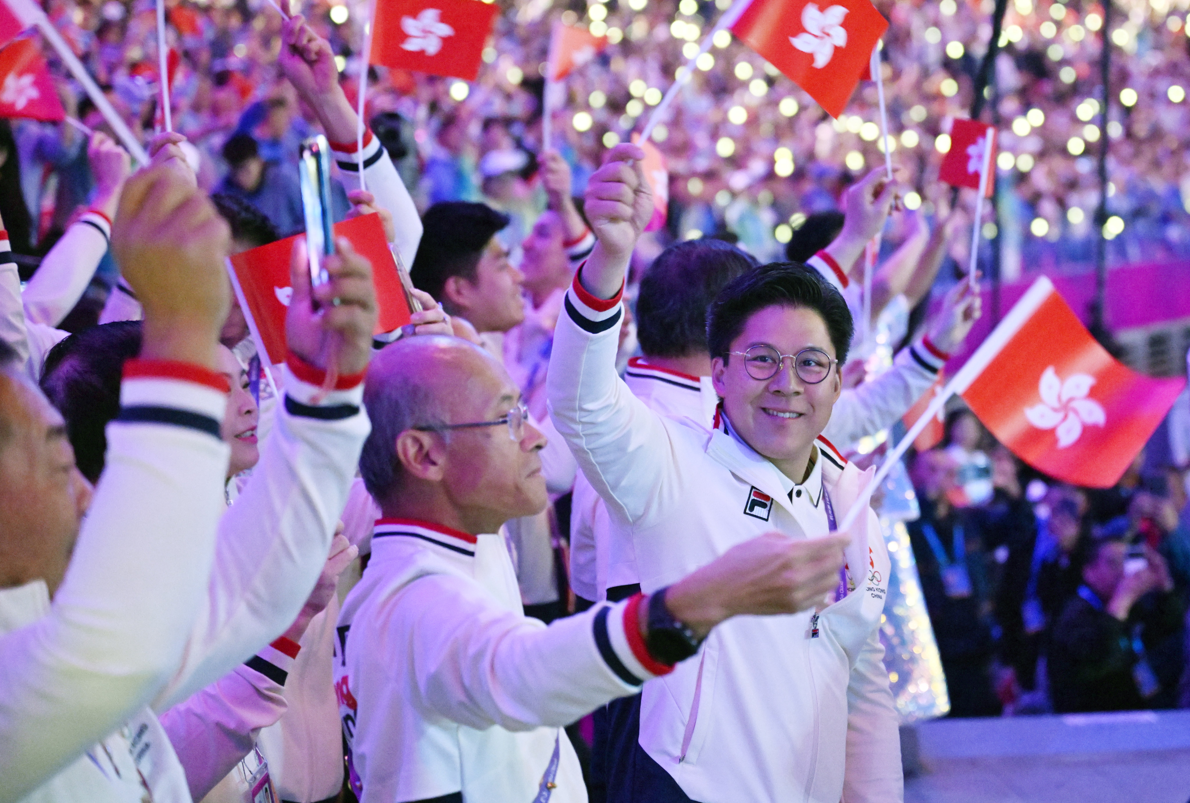 Hong Kong’s delegation enters the Hangzhou Olympic Sports Centre Stadium during the closing ceremony of the Asian Games. Photo: Xinhua