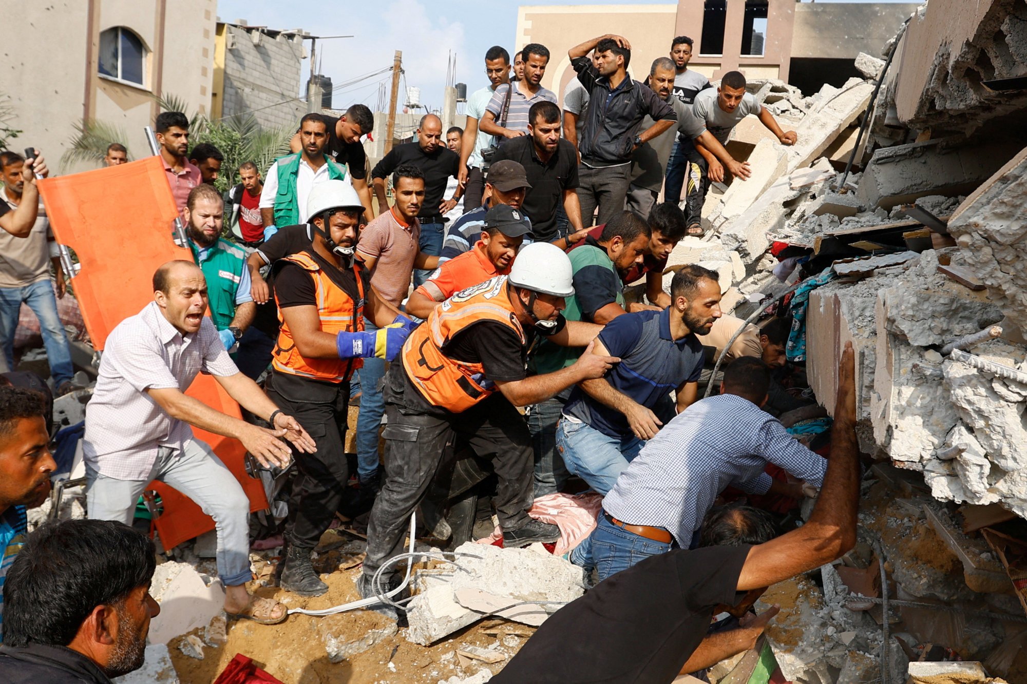 Around 1,000 dead in Israel-Hamas war, as Lebanon’s Hezbollah also