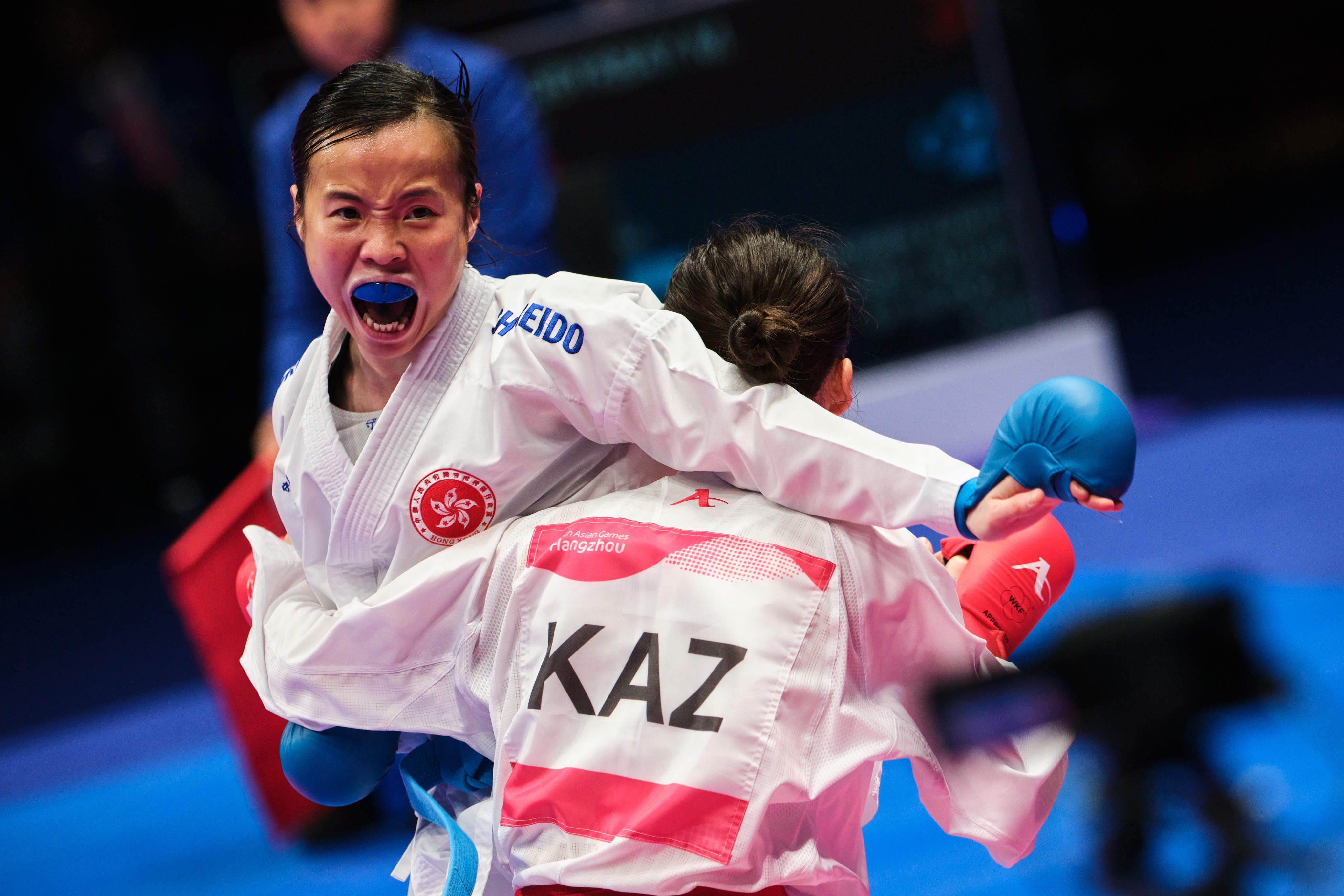 Tsang Yee-ting (left) exits Asian Games with a disappointing performance in the women’s -50kg kumite. Photo: SF&OC