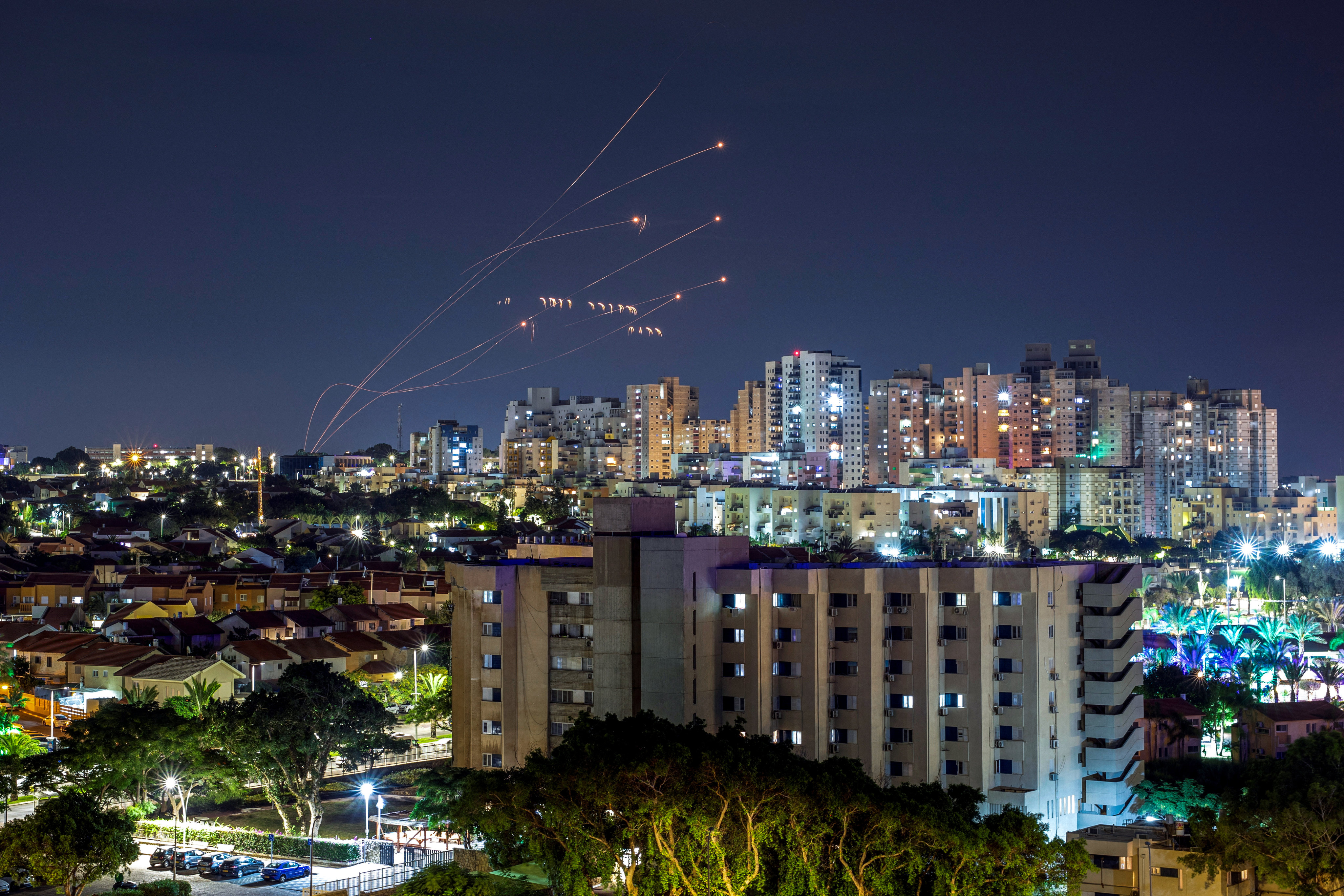 Israeli anti-missile systems intercept rockets launched from the Gaza Strip, as seen from Ashkelon in southern Israel on Saturday. Photo: Reuters