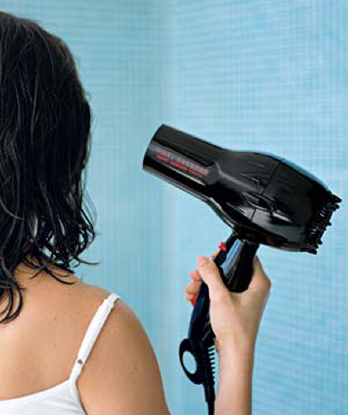 Does going to sleep with wet hair really make you sick? No, but it causes damage and brittleness