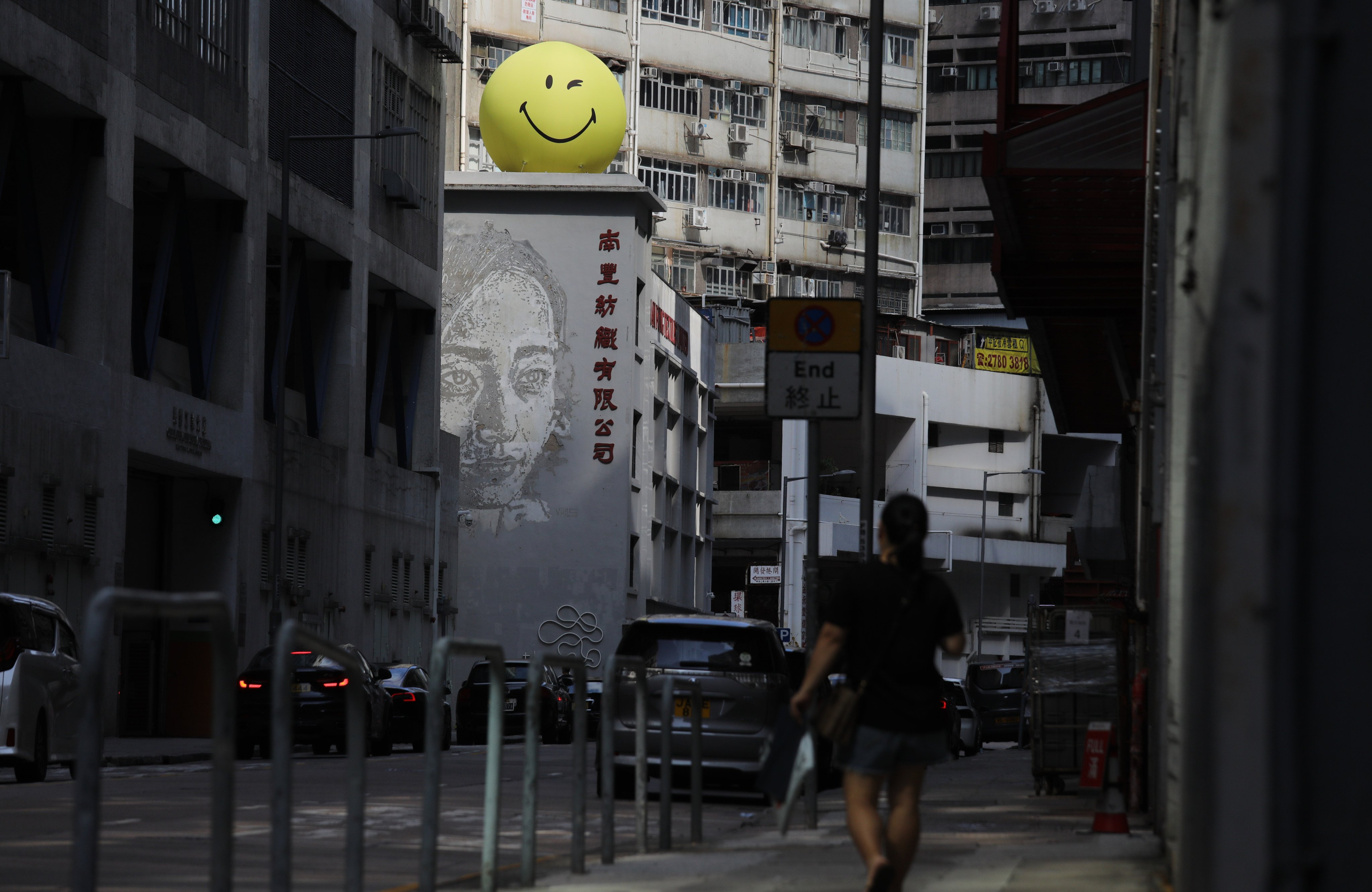A smiling face sits atop The Mills in Tsuen Wan as a response to World Smile Day and World Mental Health Day in October. Photo: Xiaomei Chen