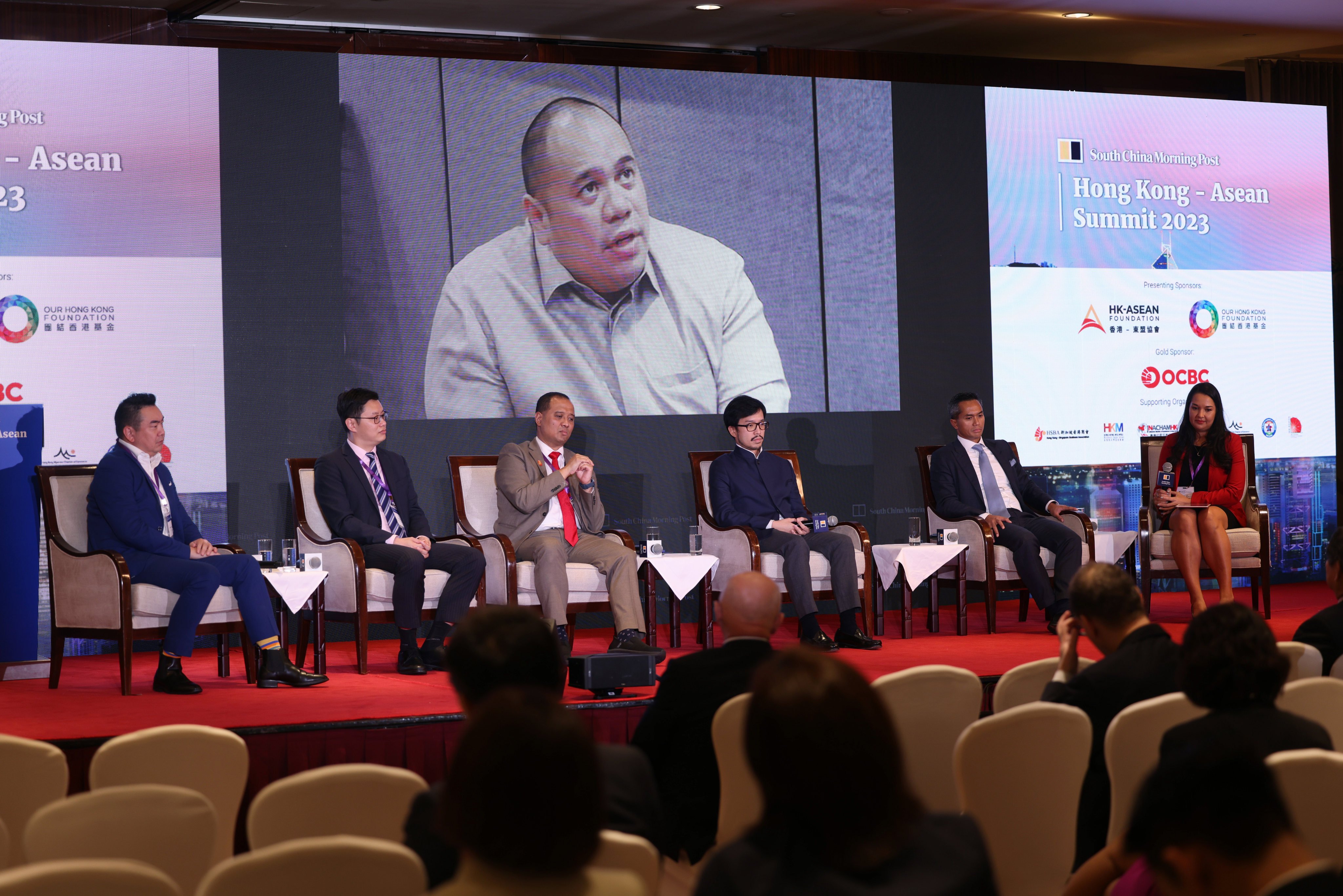 Pandu Patria Sjahrir (on screen), vice-president director of PT TBS Energi Utama Tbk, speaks about Indonesia’s goal to become a leader in the EV space during the Hong Kong-Asean Summit 2023. Photo: May Tse