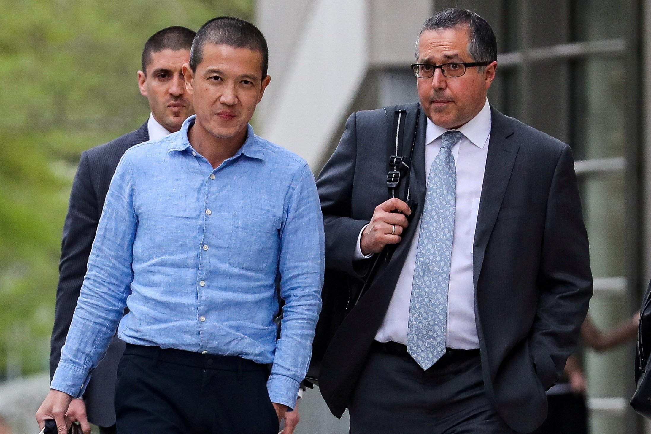 Ex-Goldman Sachs banker Roger Ng leaves federal court in New York in 2019. Photo: Reuters 