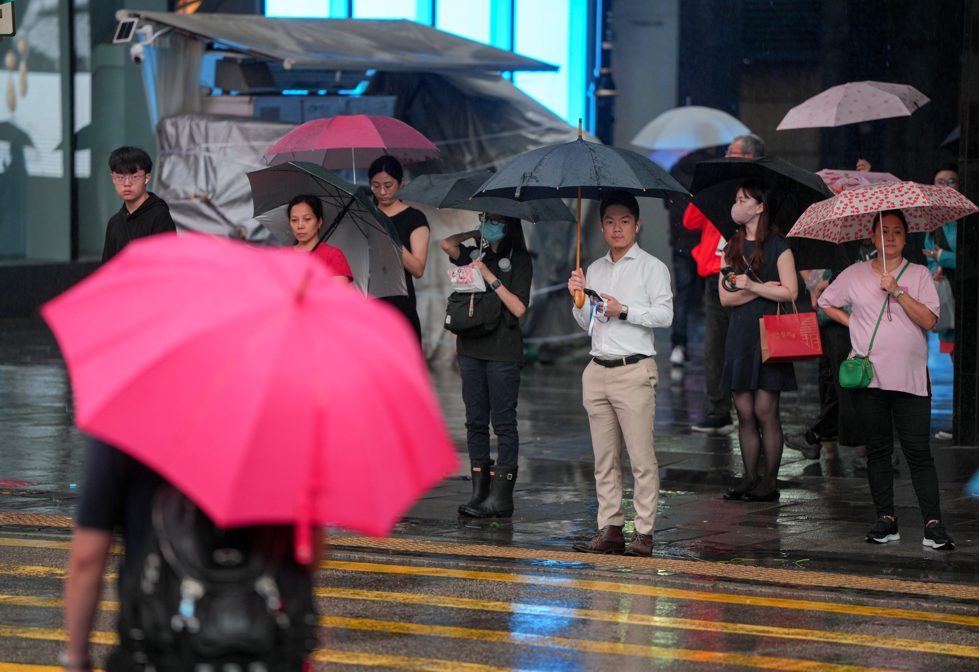 Hong Kong returns to normality as Typhoon Koinu departs city, commuters ...