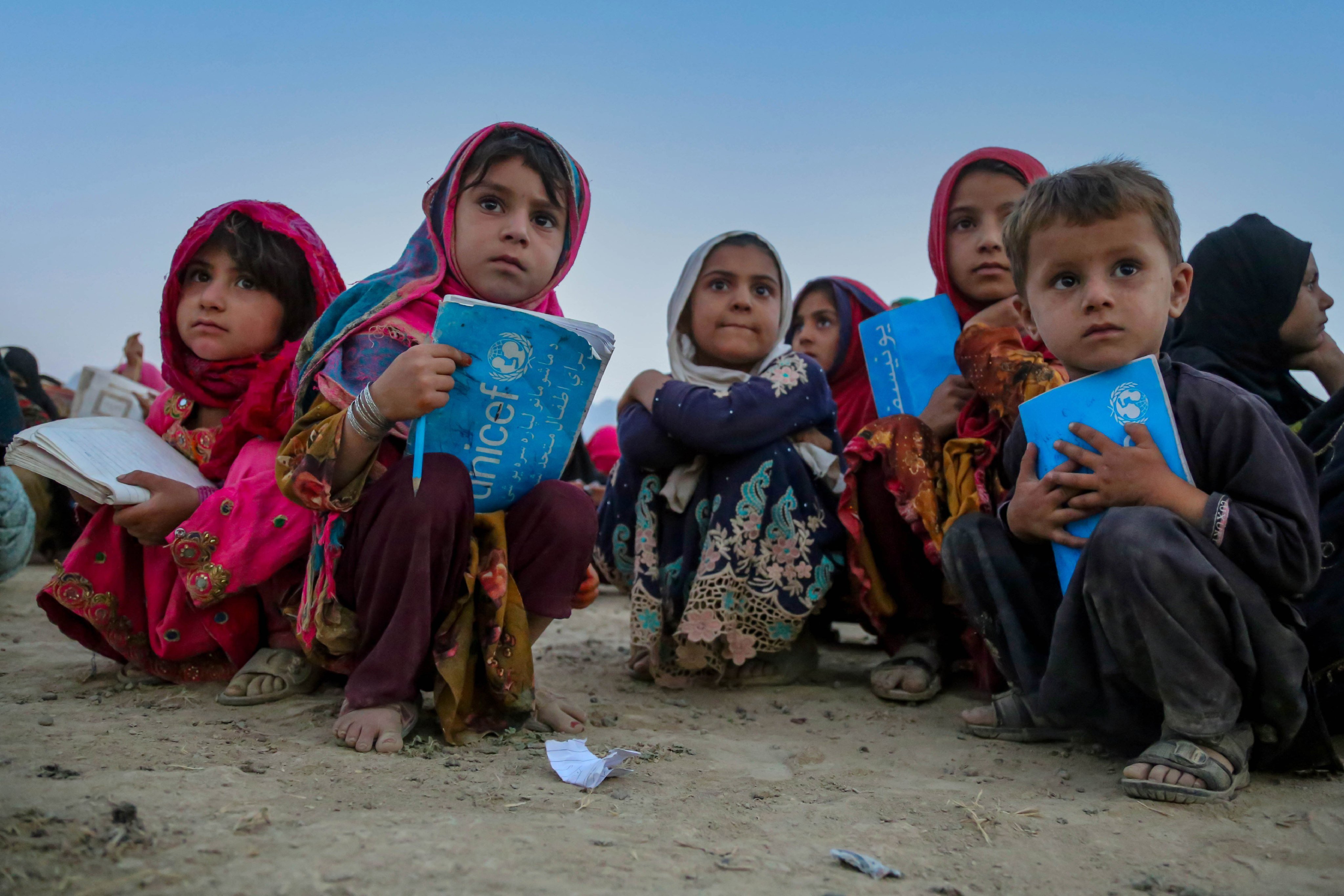 Afghan children attend a class at a mobile school run by volunteers on the outskirts of Kabul. Photo: EPA-EFE