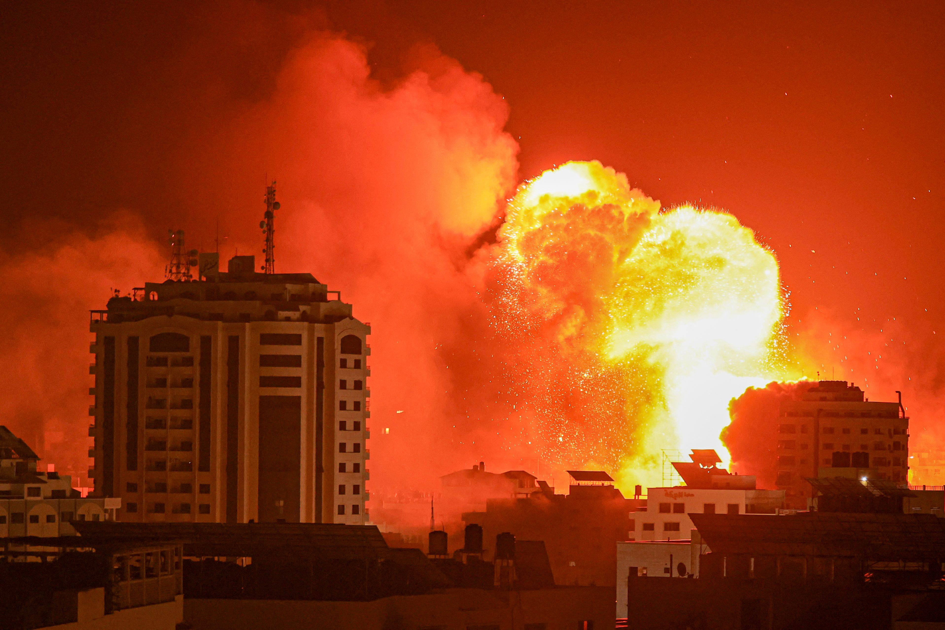 A fireball erupts after an Israeli airstrike in Gaza City on Monday. Photo: AFP