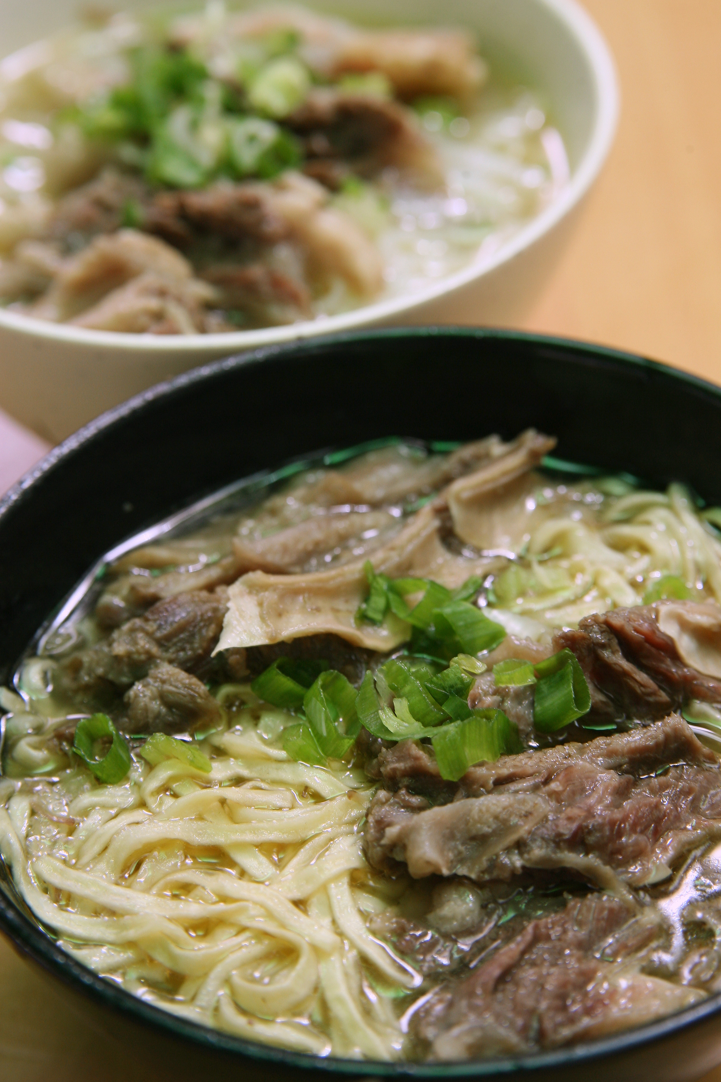 Beef brisket with rice noodles (top) and beef brisket with e-fu noodles at Kau Kee. Photo: SCMP