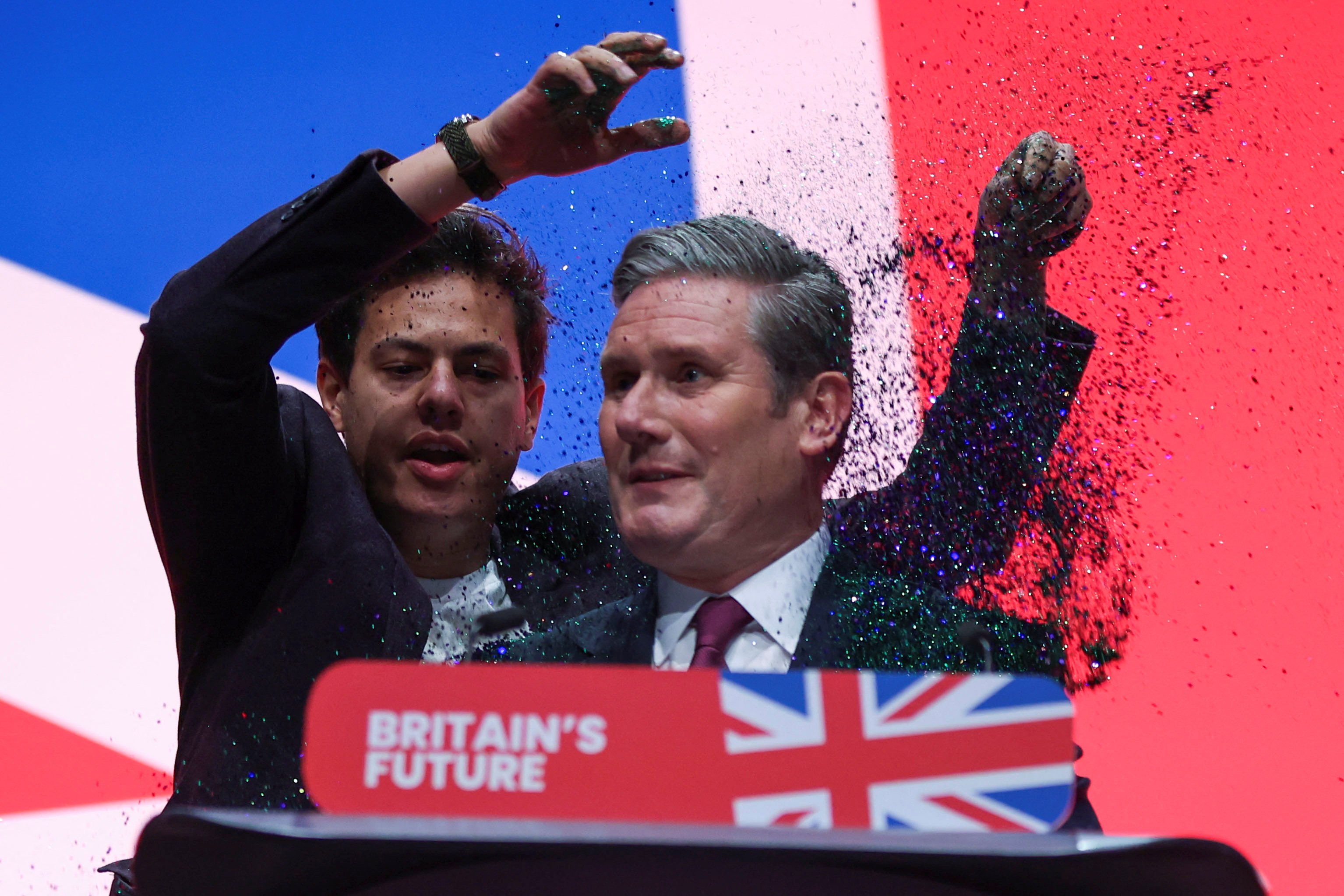 A protester throws glitter at Britain’s Labour Party Leader Keir Starmer in Liverpool, Britain on Tuesday. Photo: Reuters