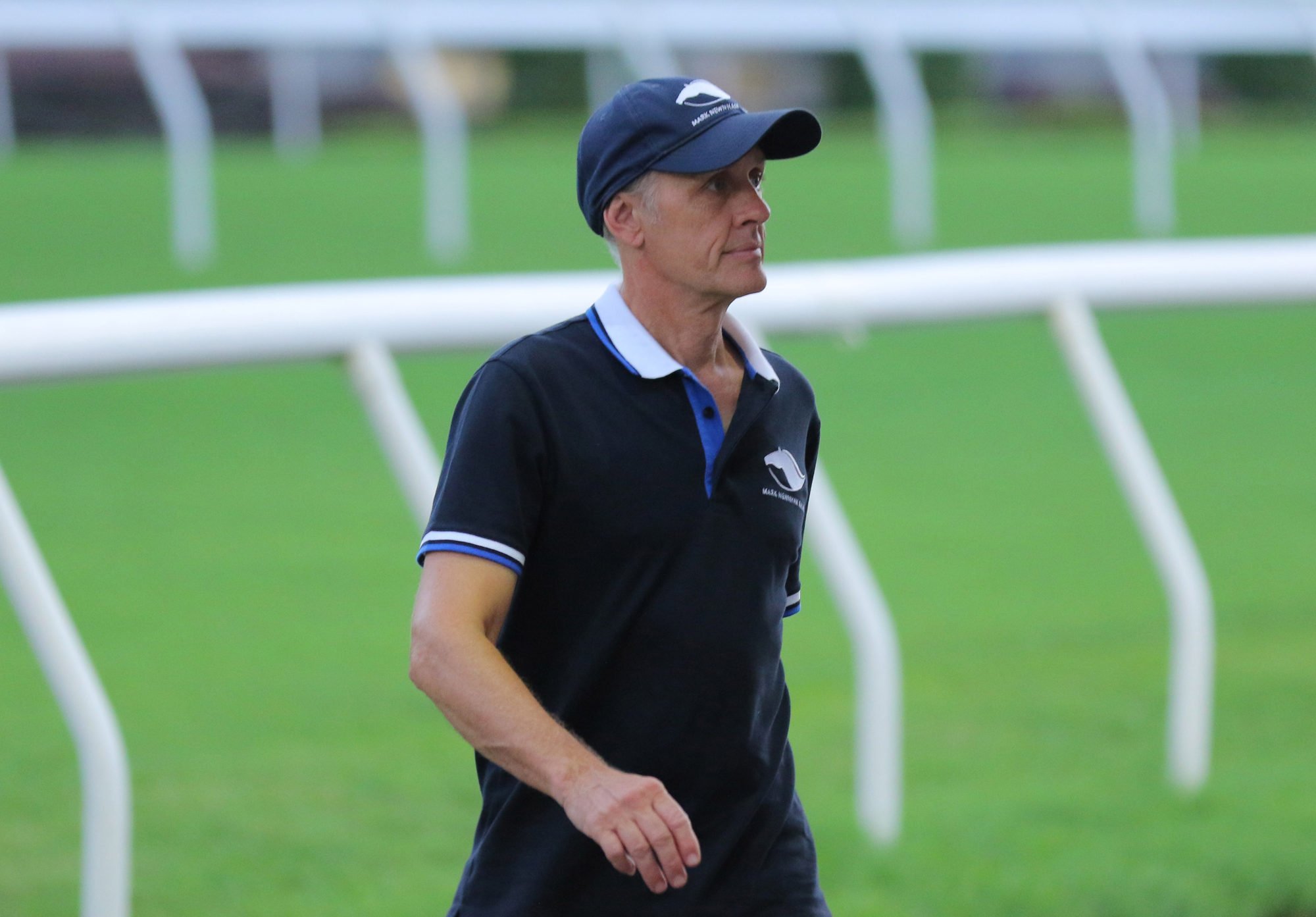 Trainer Mark Newnham at Sha Tin trackwork.