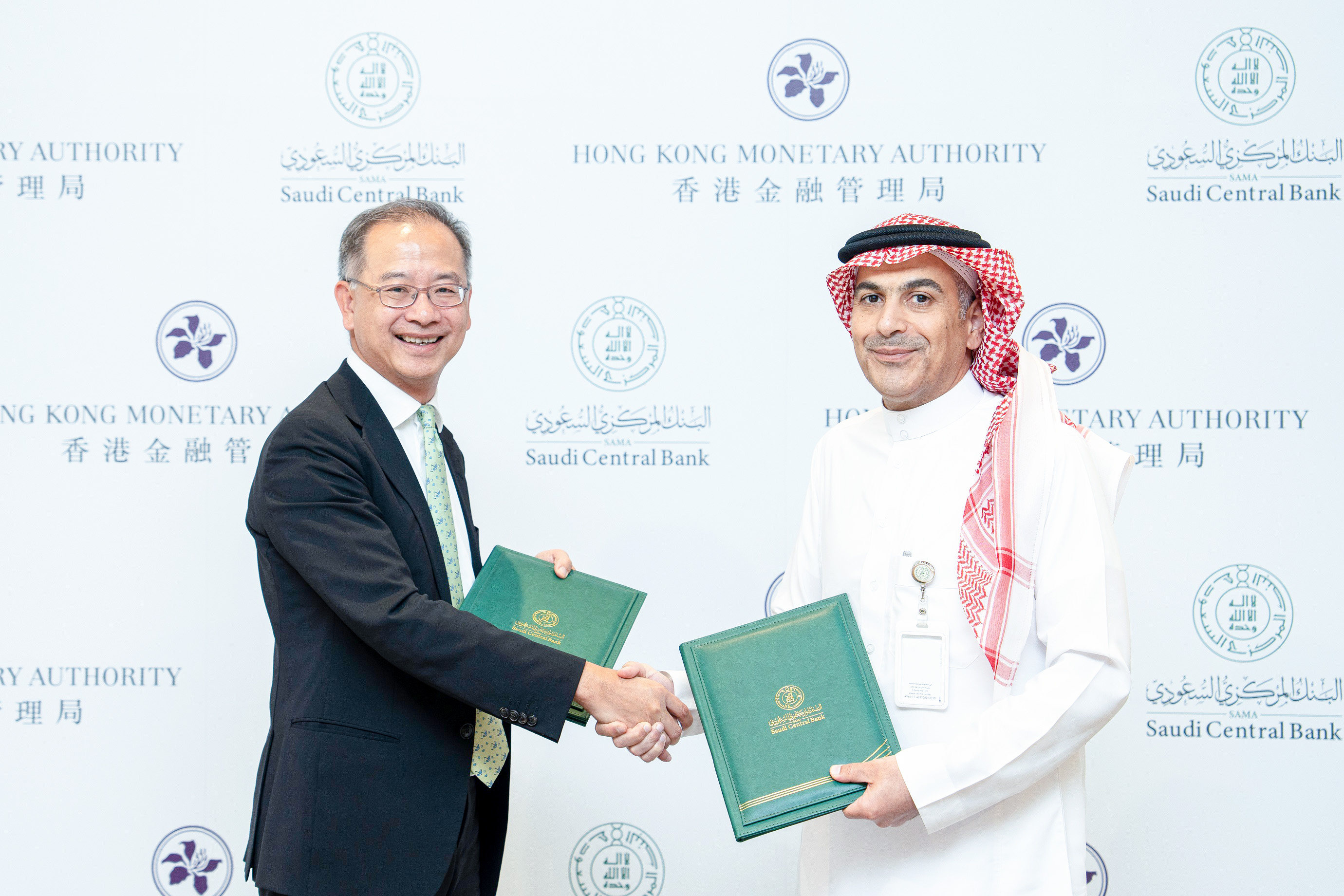 The Hong Kong Monetary Authority’s chief executive Eddie Yue Wai-man (left) and the Saudi Central Bank’s governor Ayman Al-Sayari (right) signed a Memorandum of Understanding on 26 July in Riyadh to promote collaboration on financial innovation. Photo: Handout/HKMA