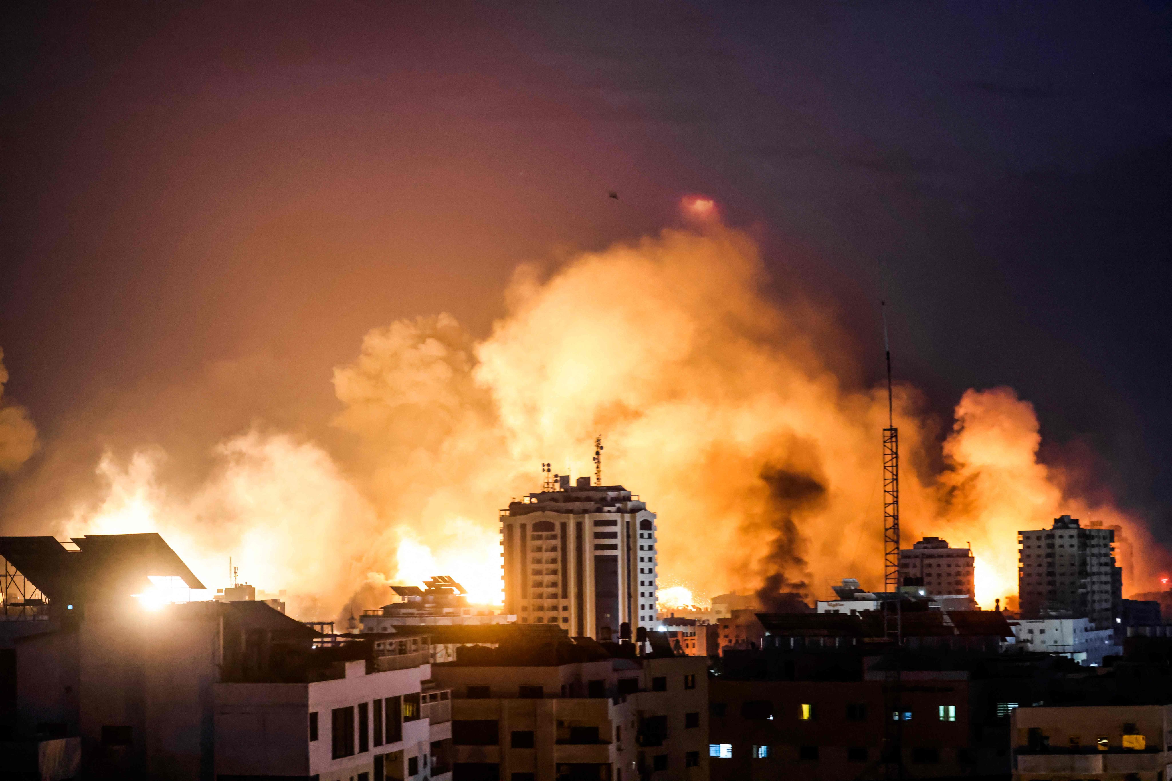 A fireball erupts during Israeli bombardment of Gaza City on Monday. Photo: AFP