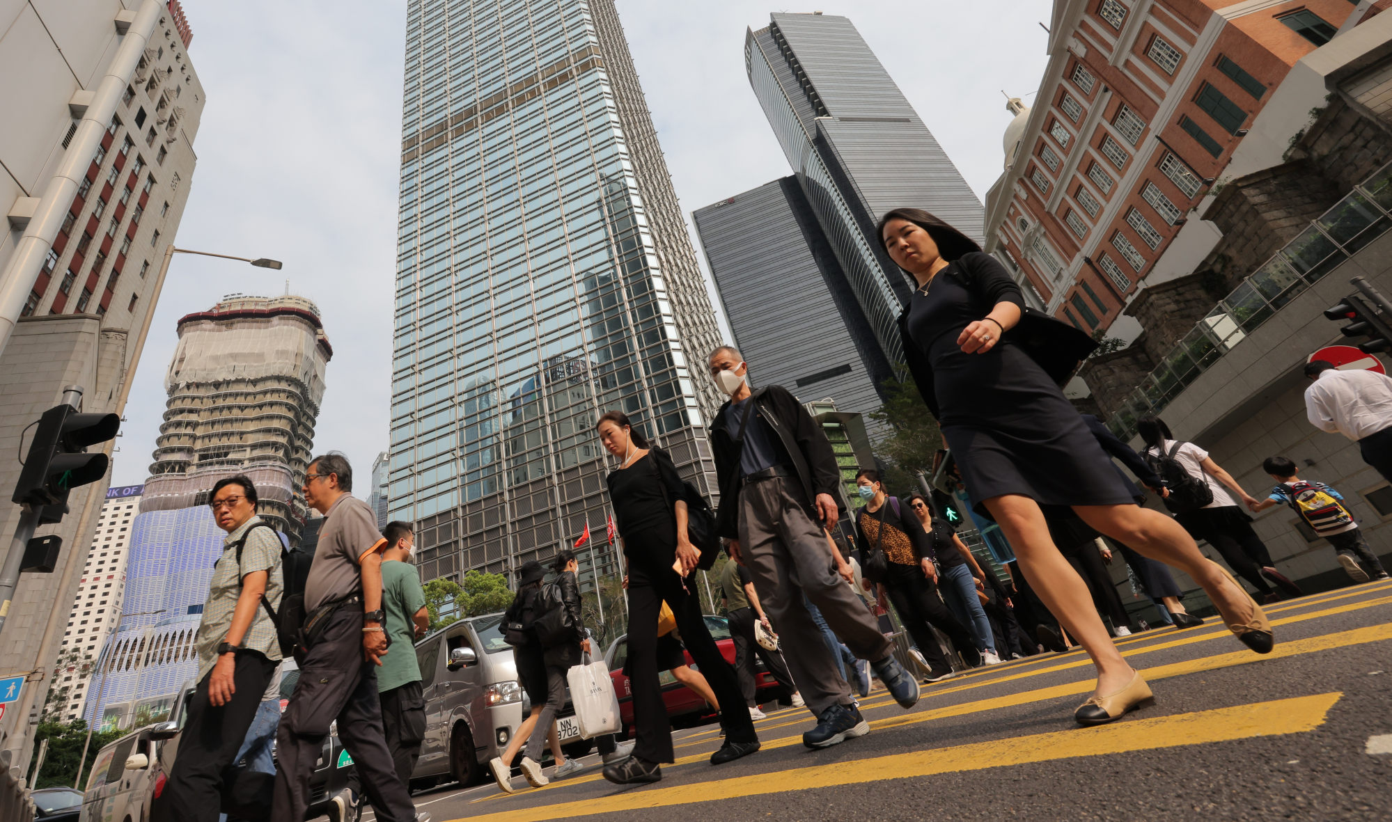 People crossing the road in Central. Photo: Jelly Tse