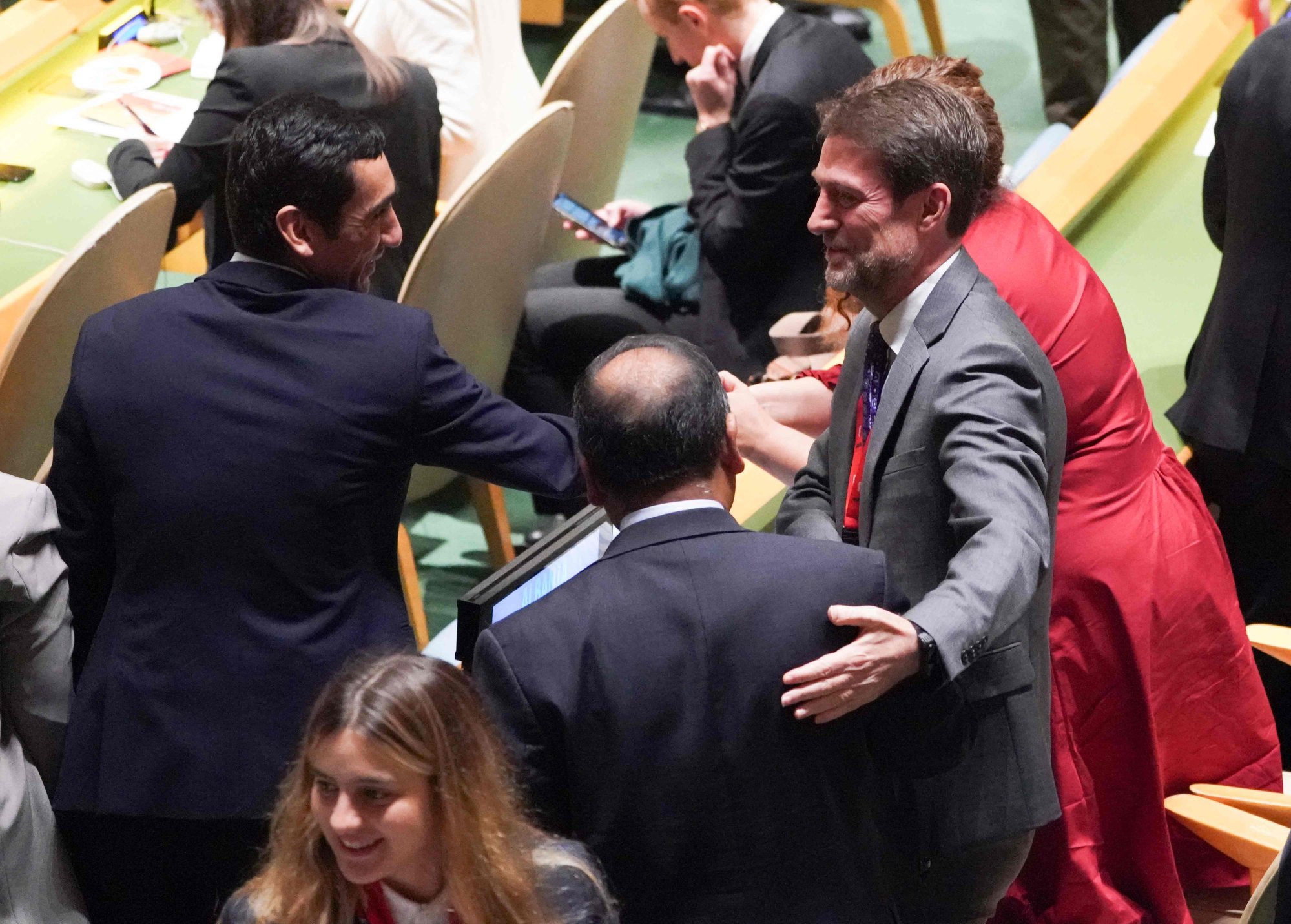 Members of the Albanian delegation celebrate as the UN General Assembly elects new members to the Human Rights Council at UN headquarters in New York on Tuesday. Photo: AFP