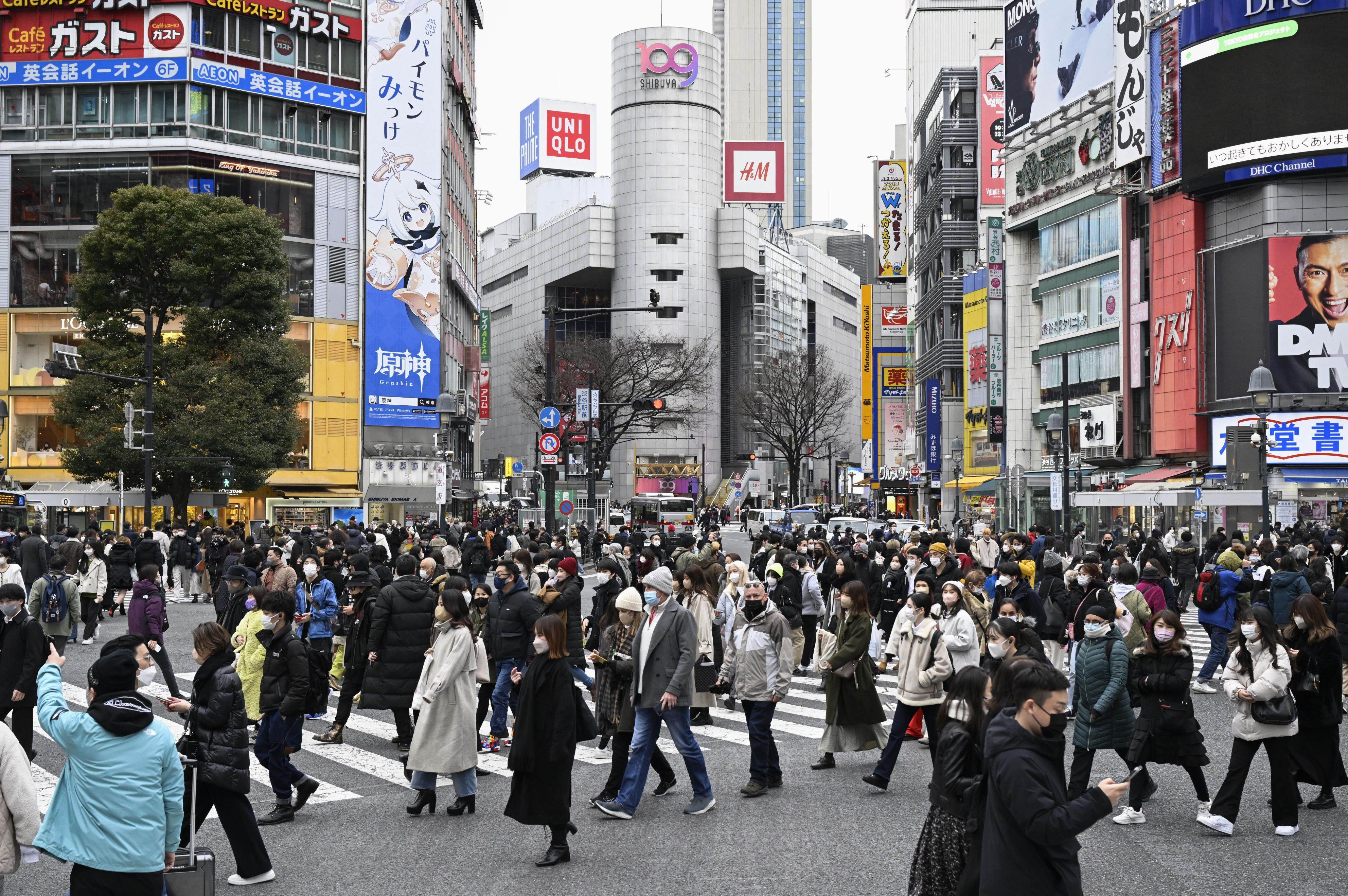 People crossing in Tokyo’s Shibuya district. Photo: Kyodo