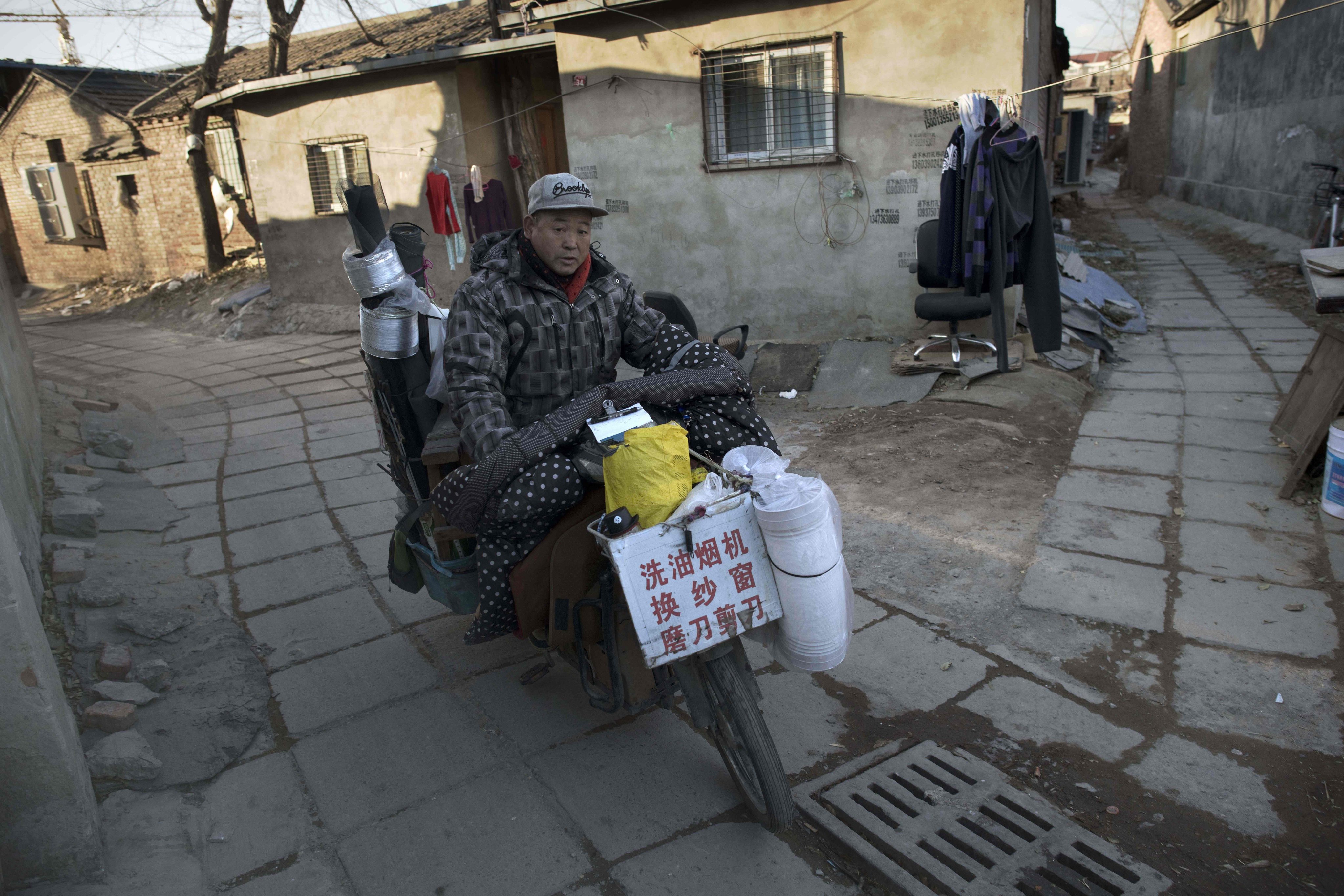 China’s State Council says more must be done to ensure that people, particularly in poorer rural regions, stay warm this winter. Photo: AFP